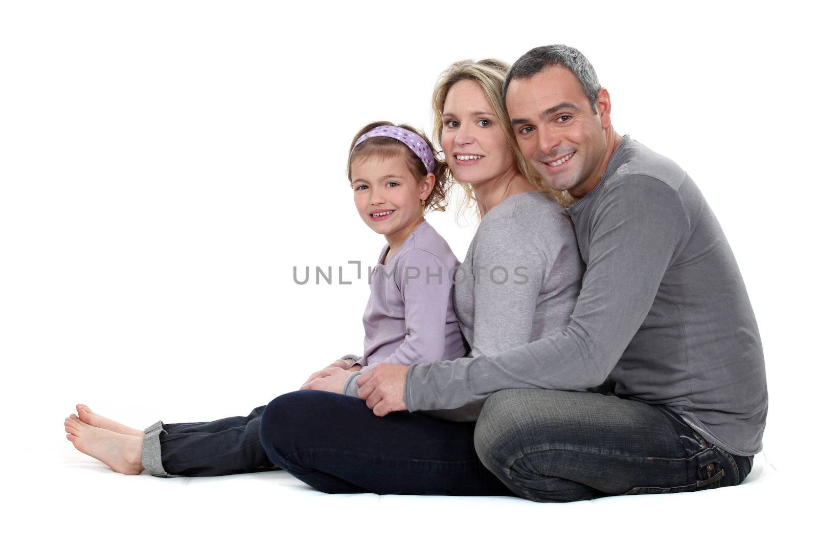 Portrait of a couple with their daughter by phovoir