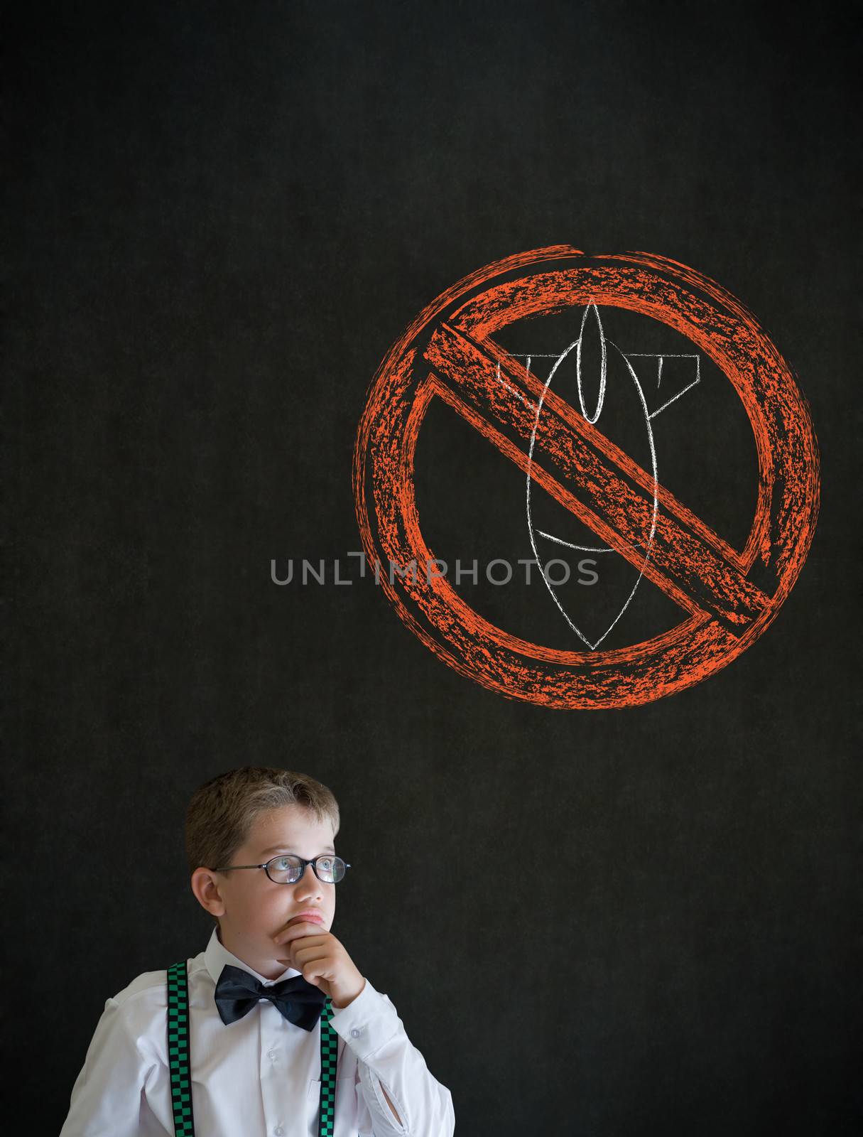 Thinking boy dressed up as business man with politician no bombs war pacifist sign on blackboard background