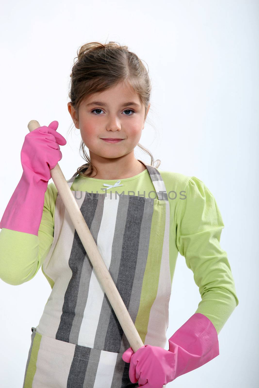 cute little girl dressed as a cleaning lady