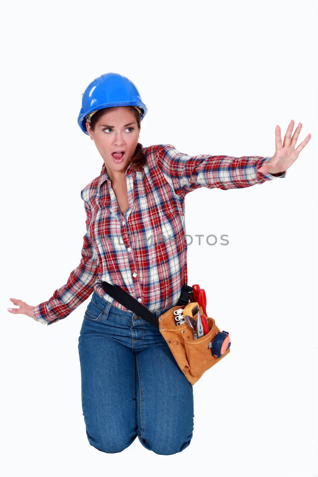 Female laborer doing sign with her hand by phovoir