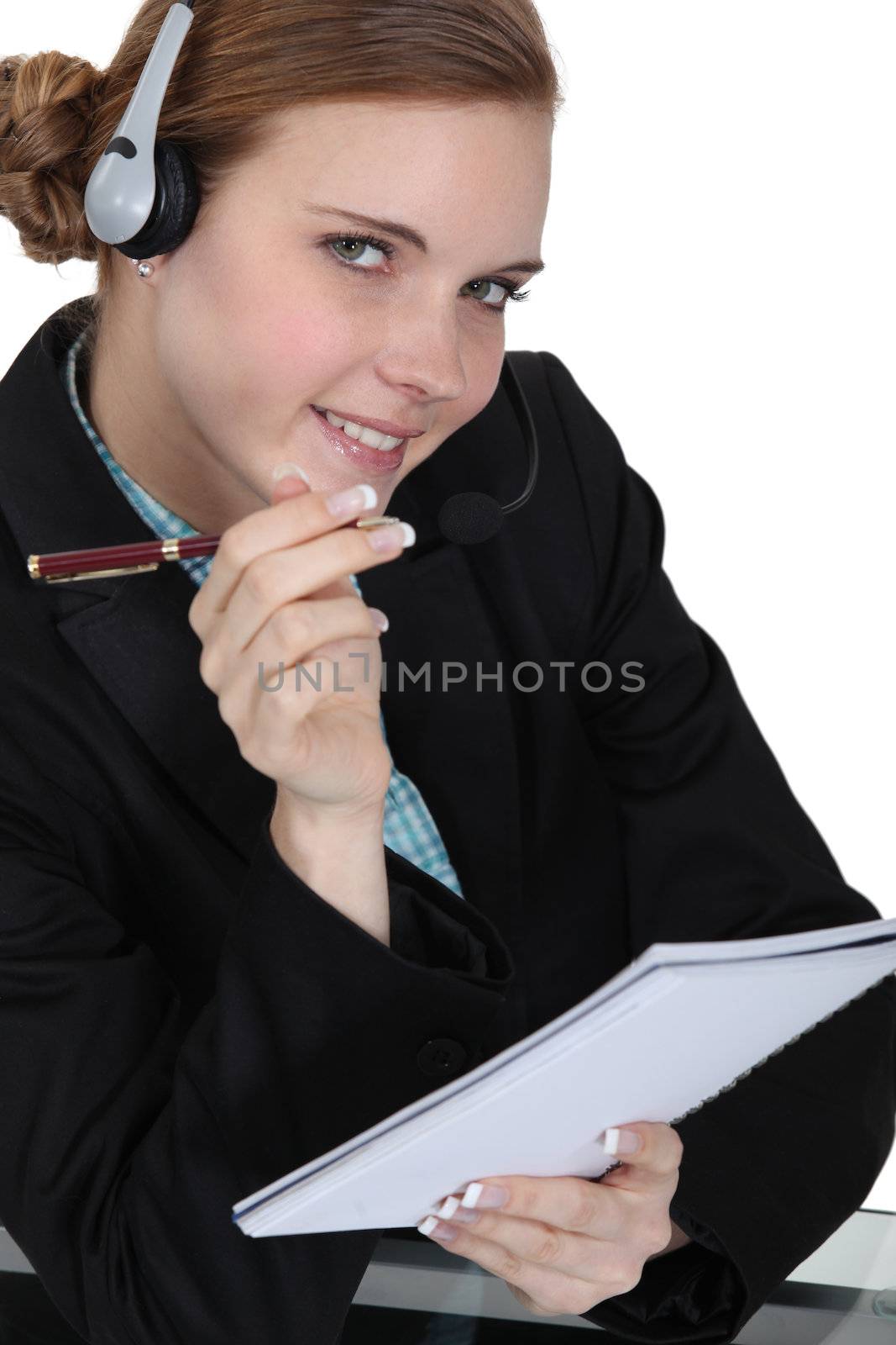 A businesswoman answering a hotline.