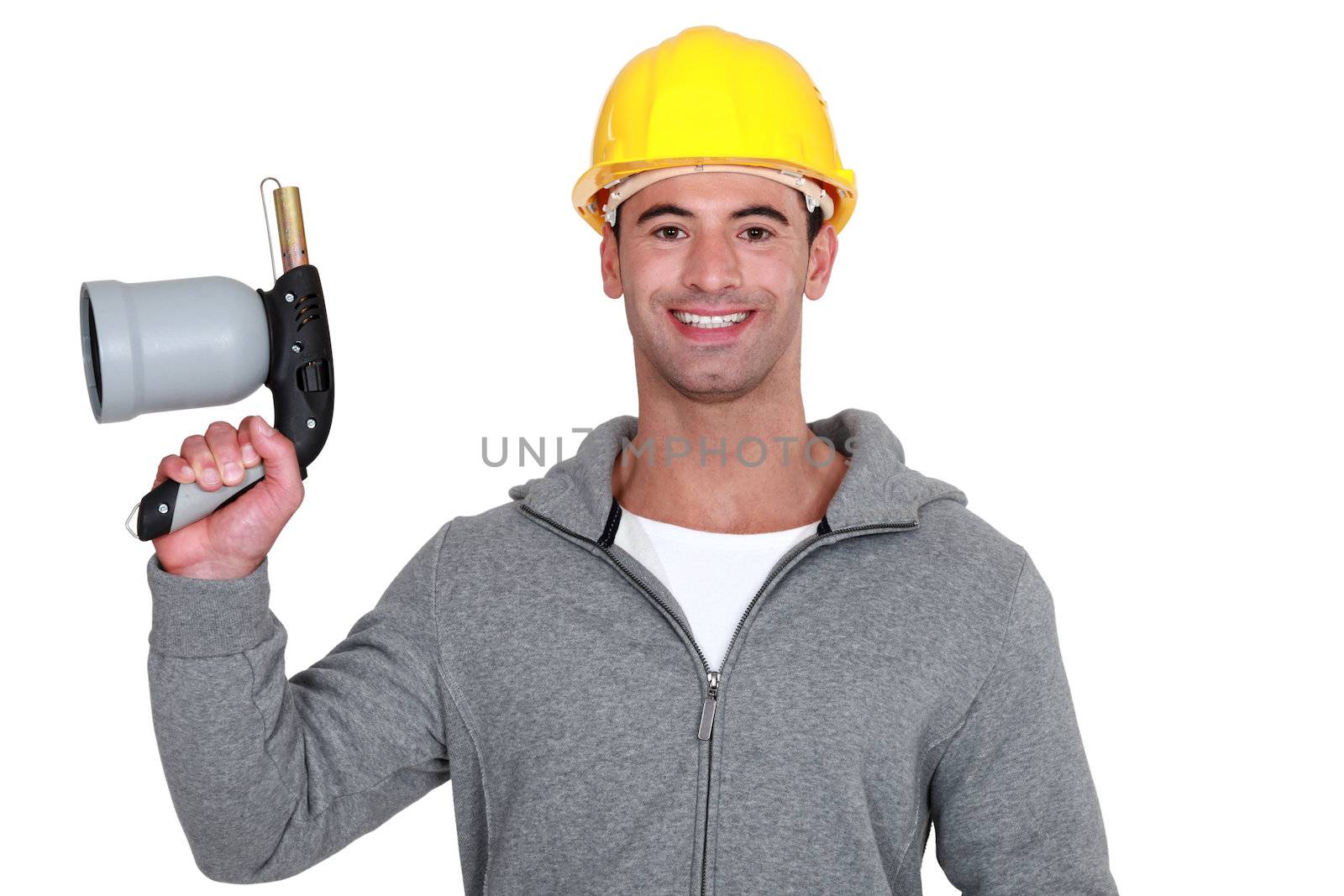 Man holding blowtorch