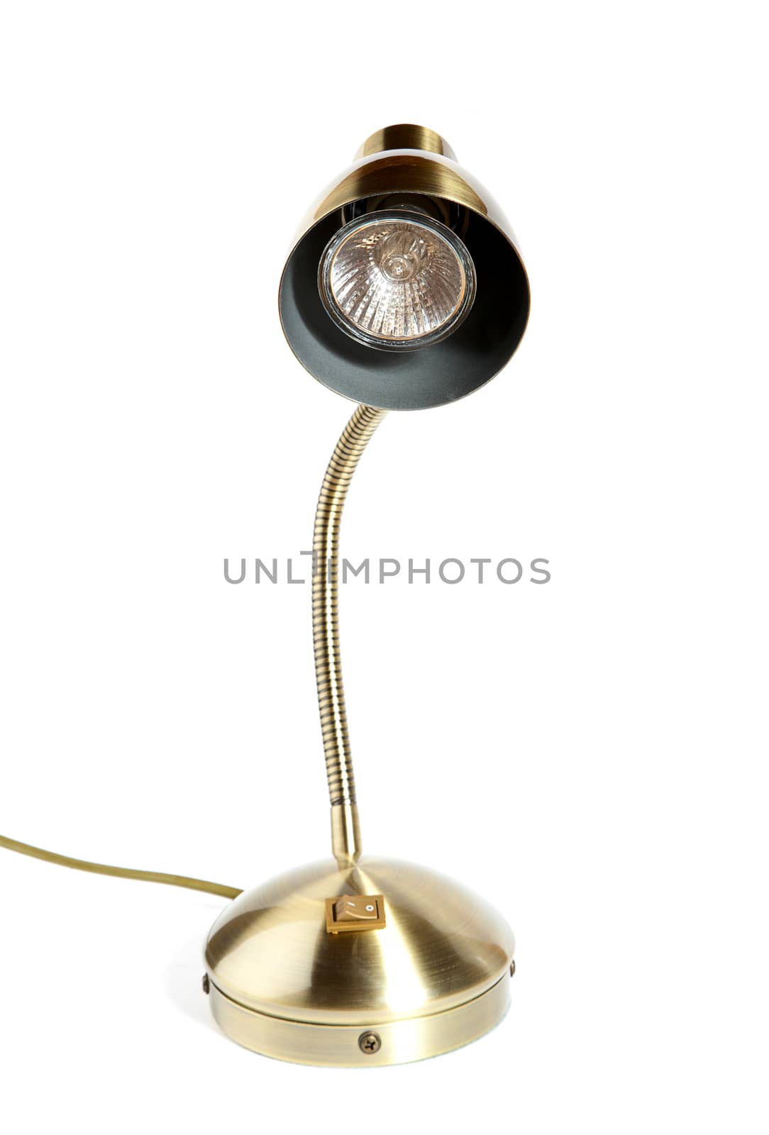 Desk lamp of gold colour isolated on a white background