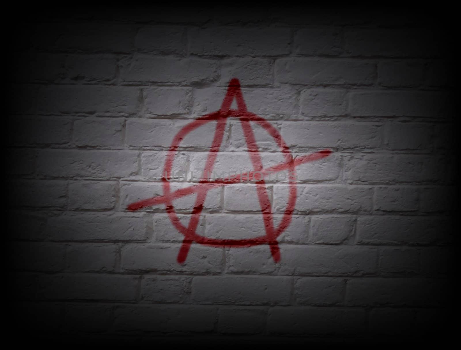 Illustration of an anarchy symbol on a white wall