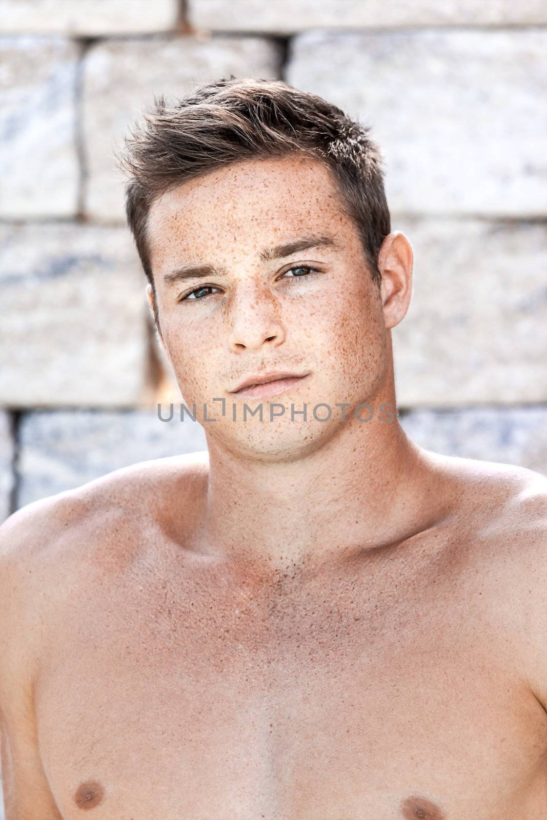 An image of a naked young man outdoor