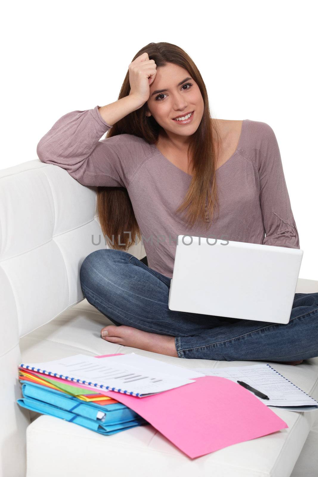 Girl doing homework by phovoir
