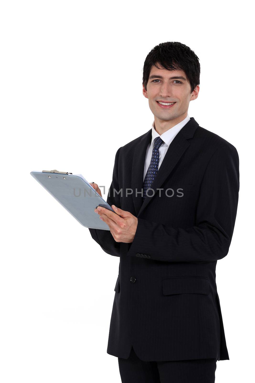 A businessman with a clipboard.