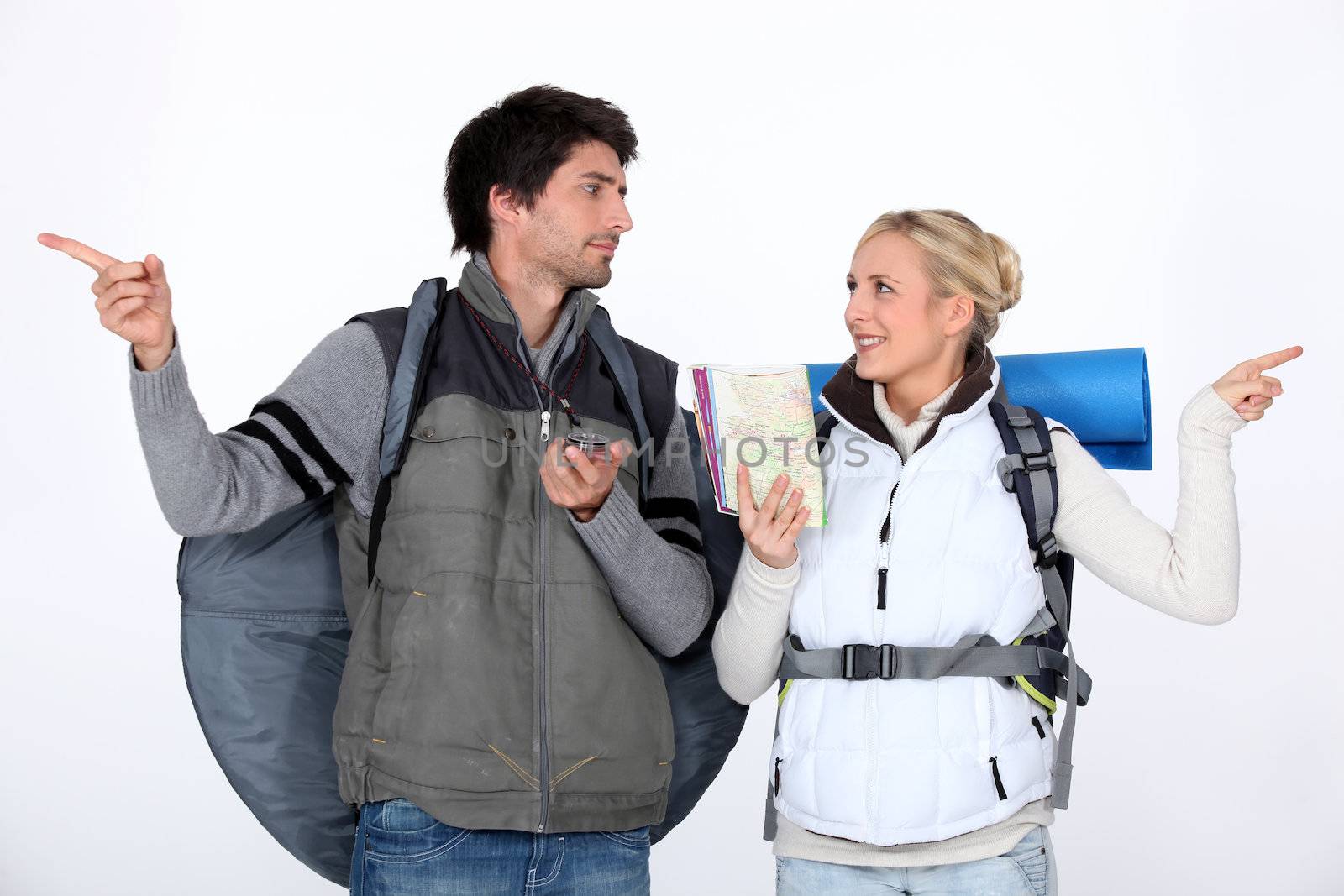 Couple going on hiking trip by phovoir