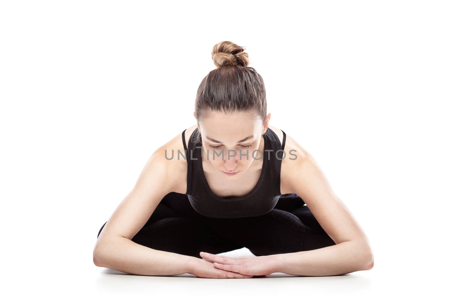 caucasian woman exercising pilates poses, isolated in studio