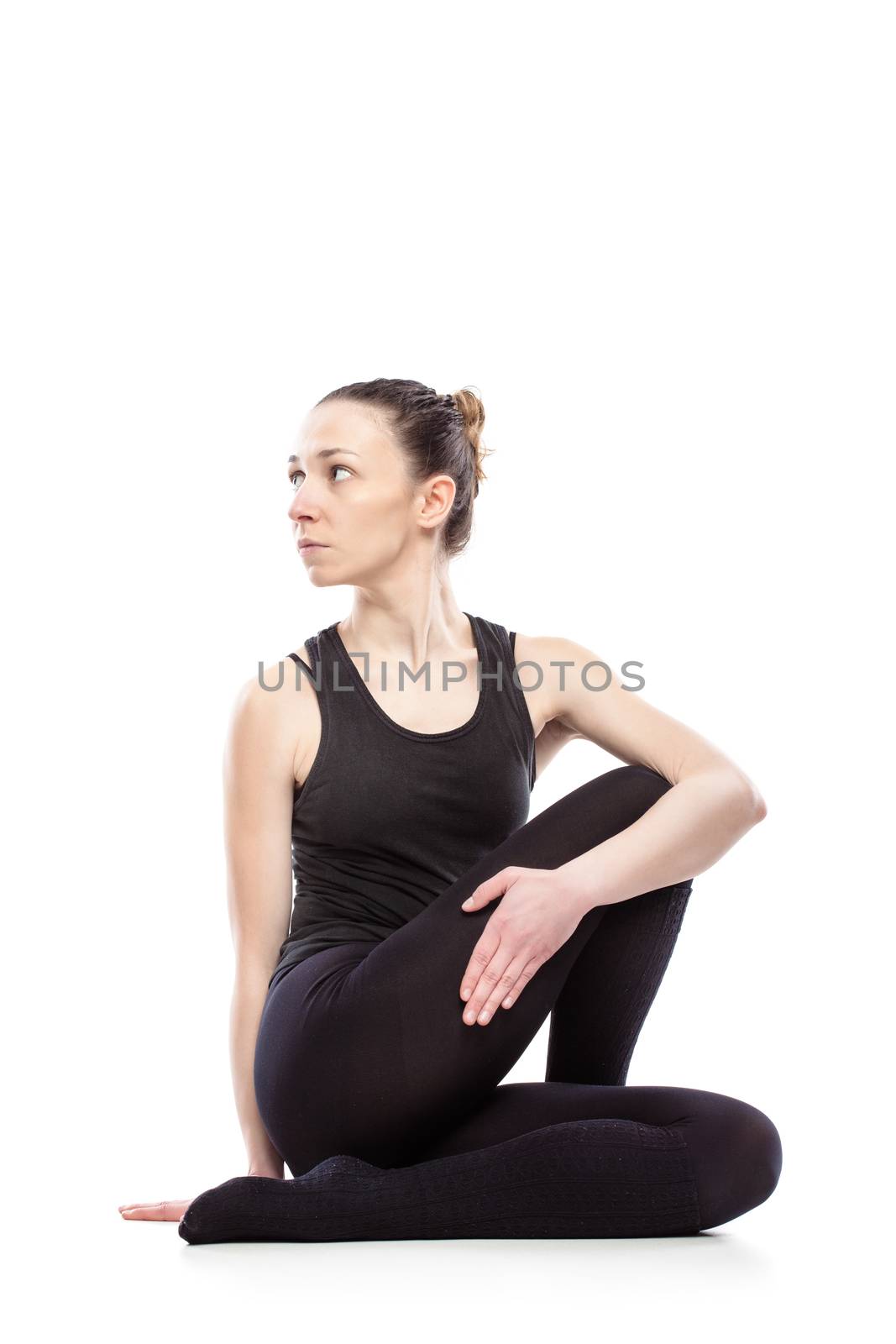 caucasian woman exercising pilates poses, isolated in studio