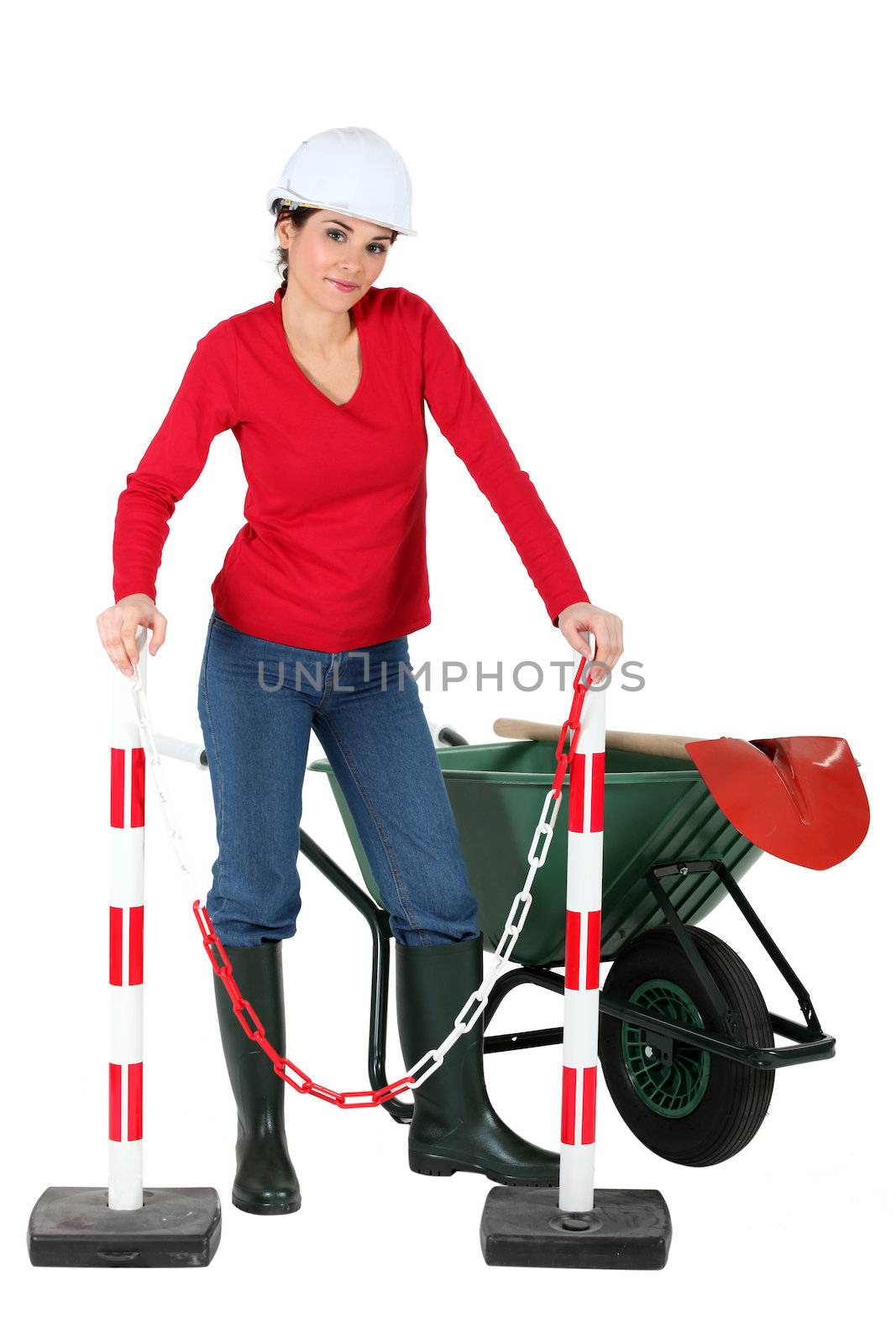 Woman with shovel and wheelbarrow