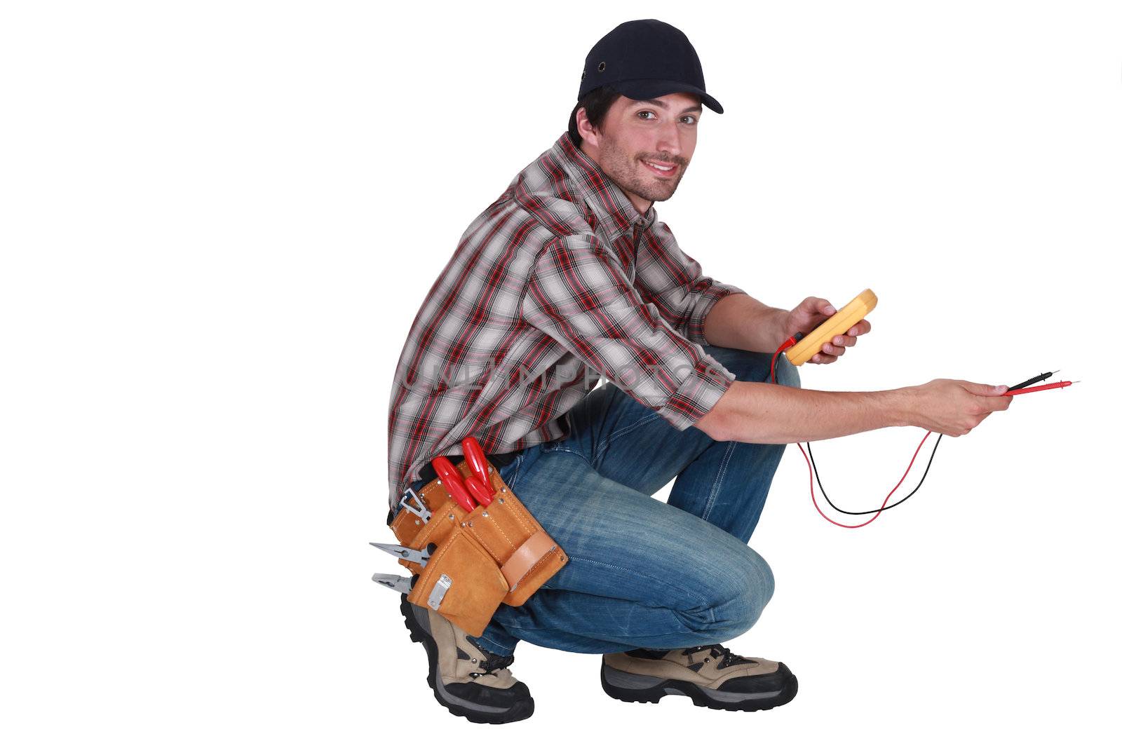 Electrician holding a tool