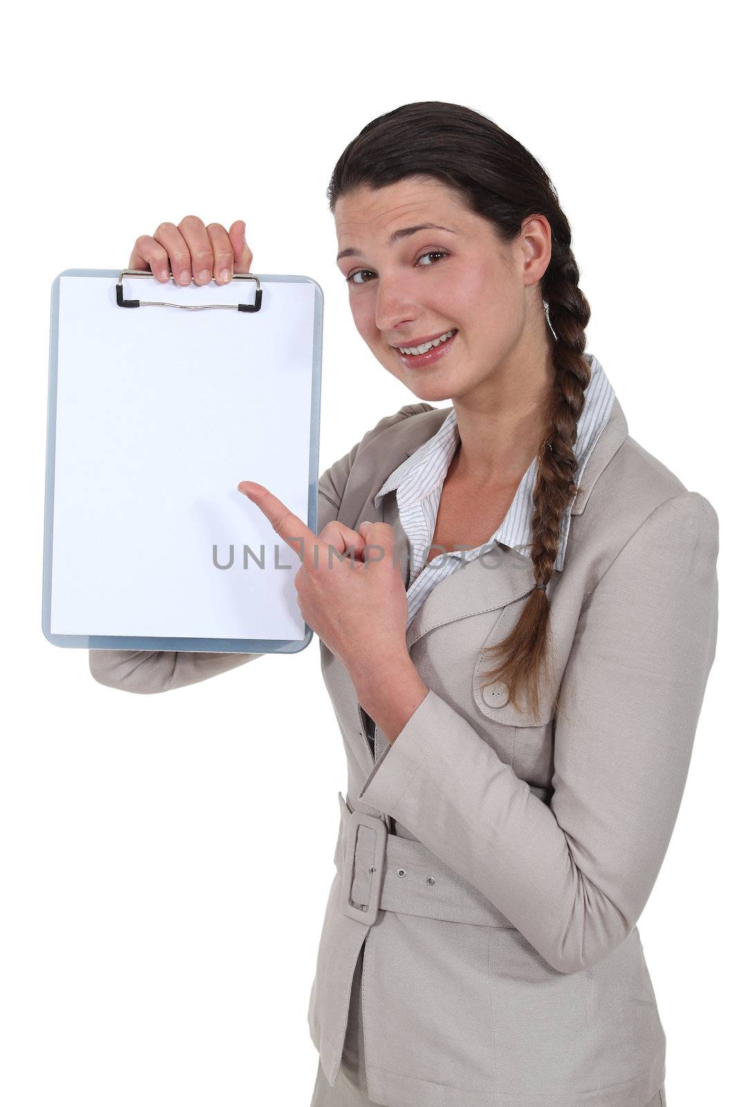 Businesswoman with a blank clipboard by phovoir