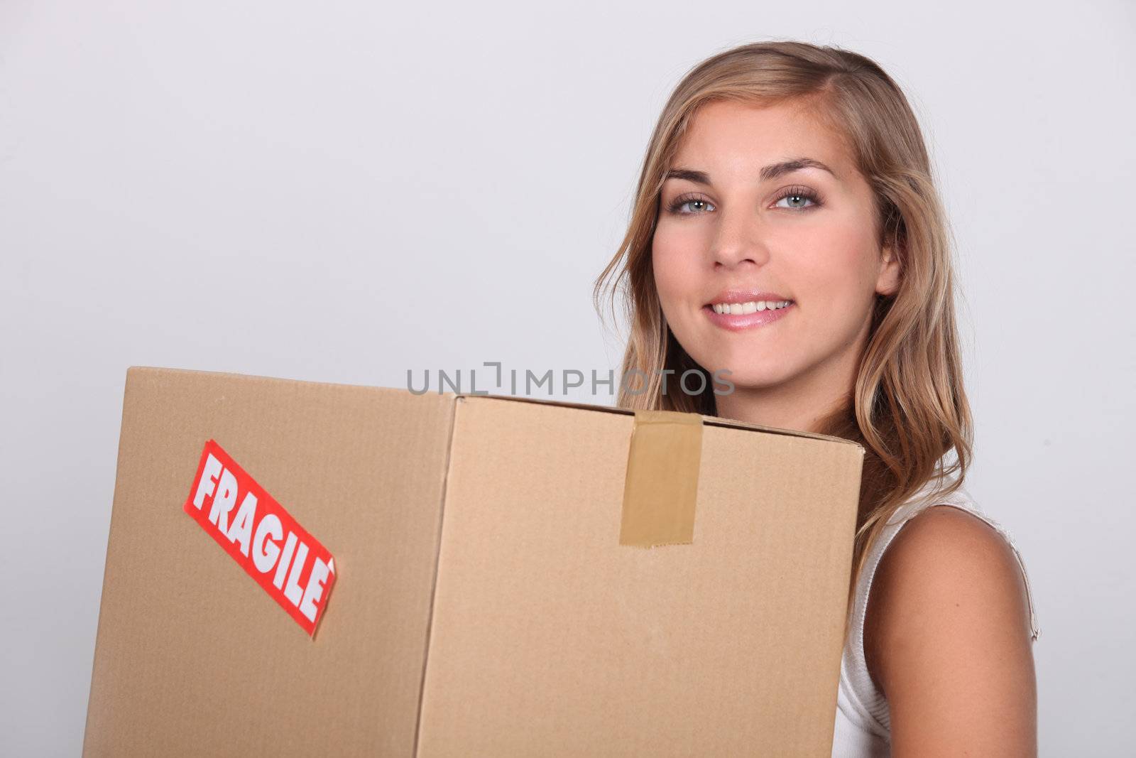 Young woman with a cardboard