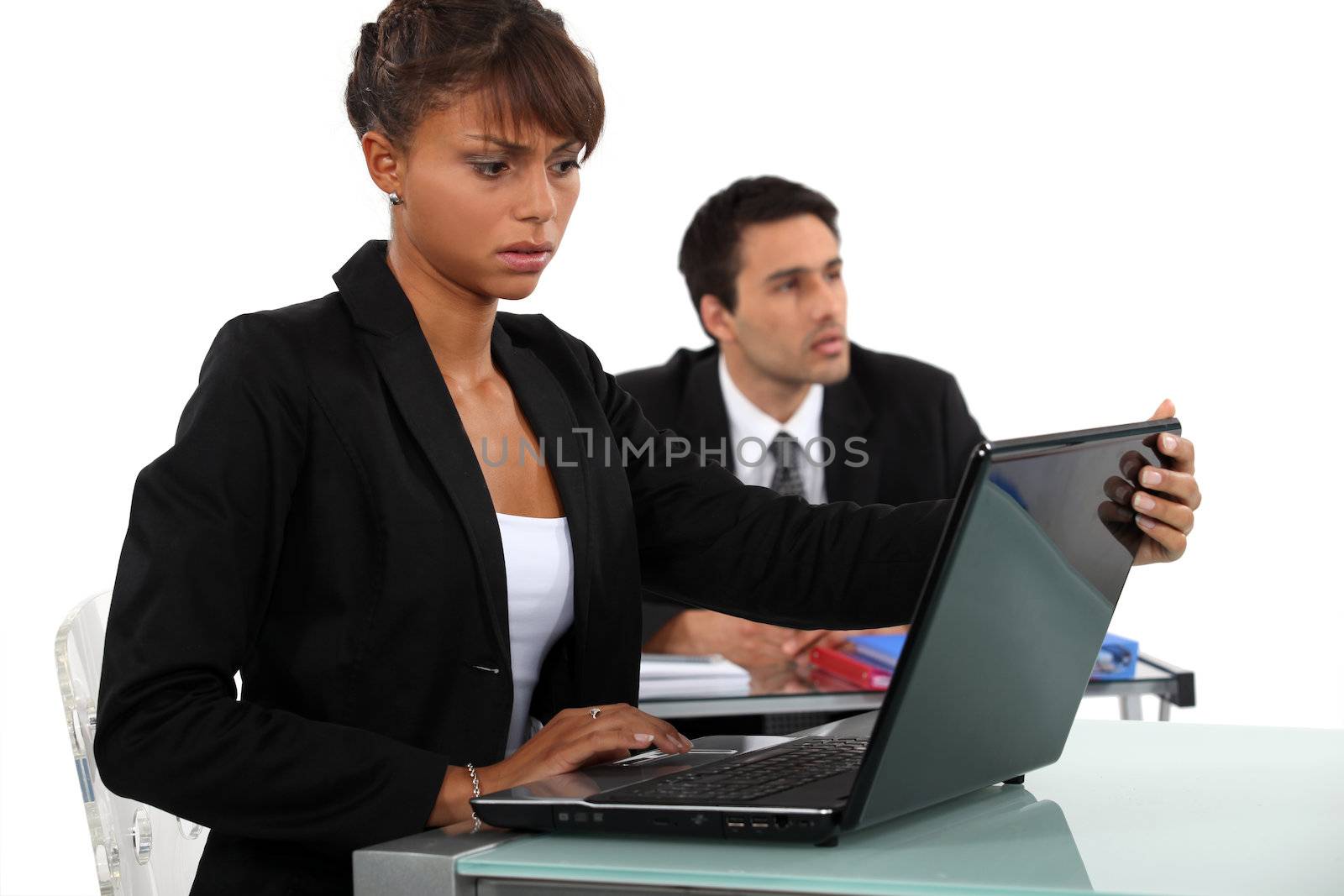 Woman disturbed by her laptop by phovoir