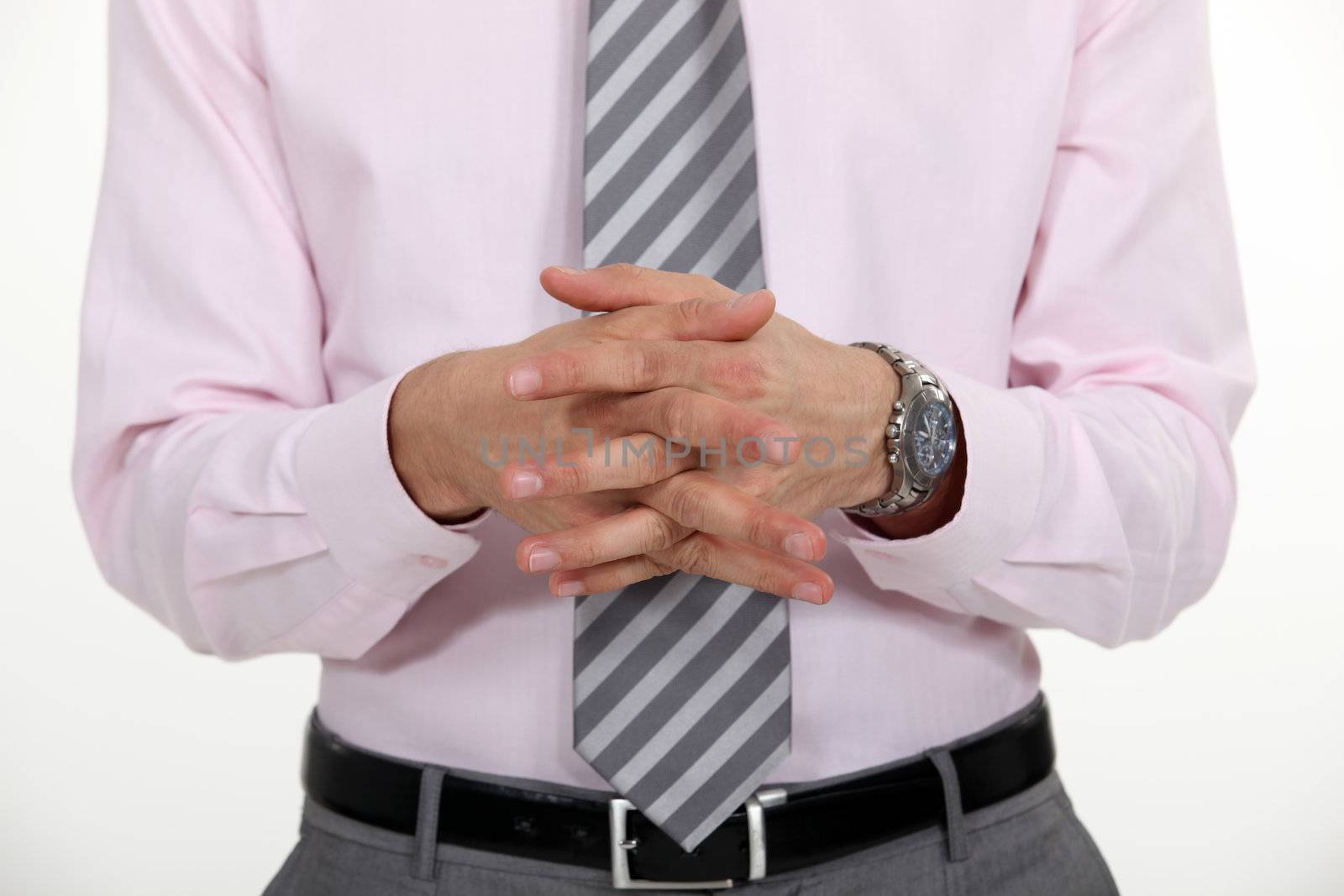 businessman with joined hands making presentation
