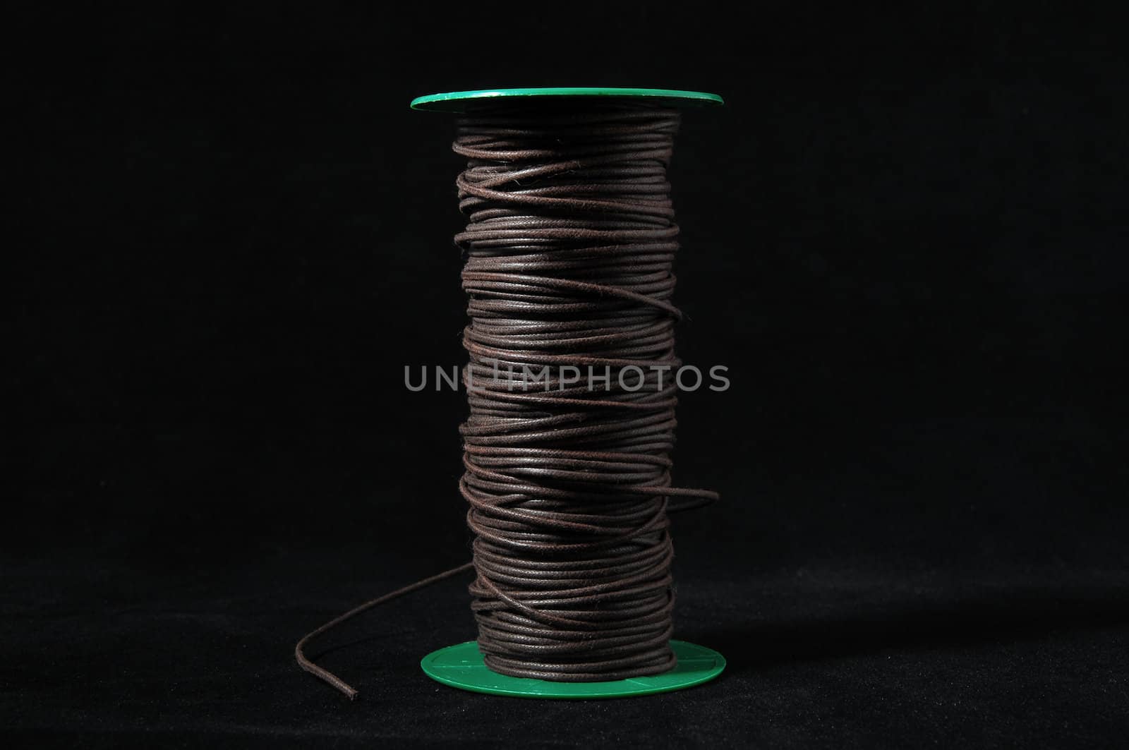 Roll of Twine isolated on a Black Background