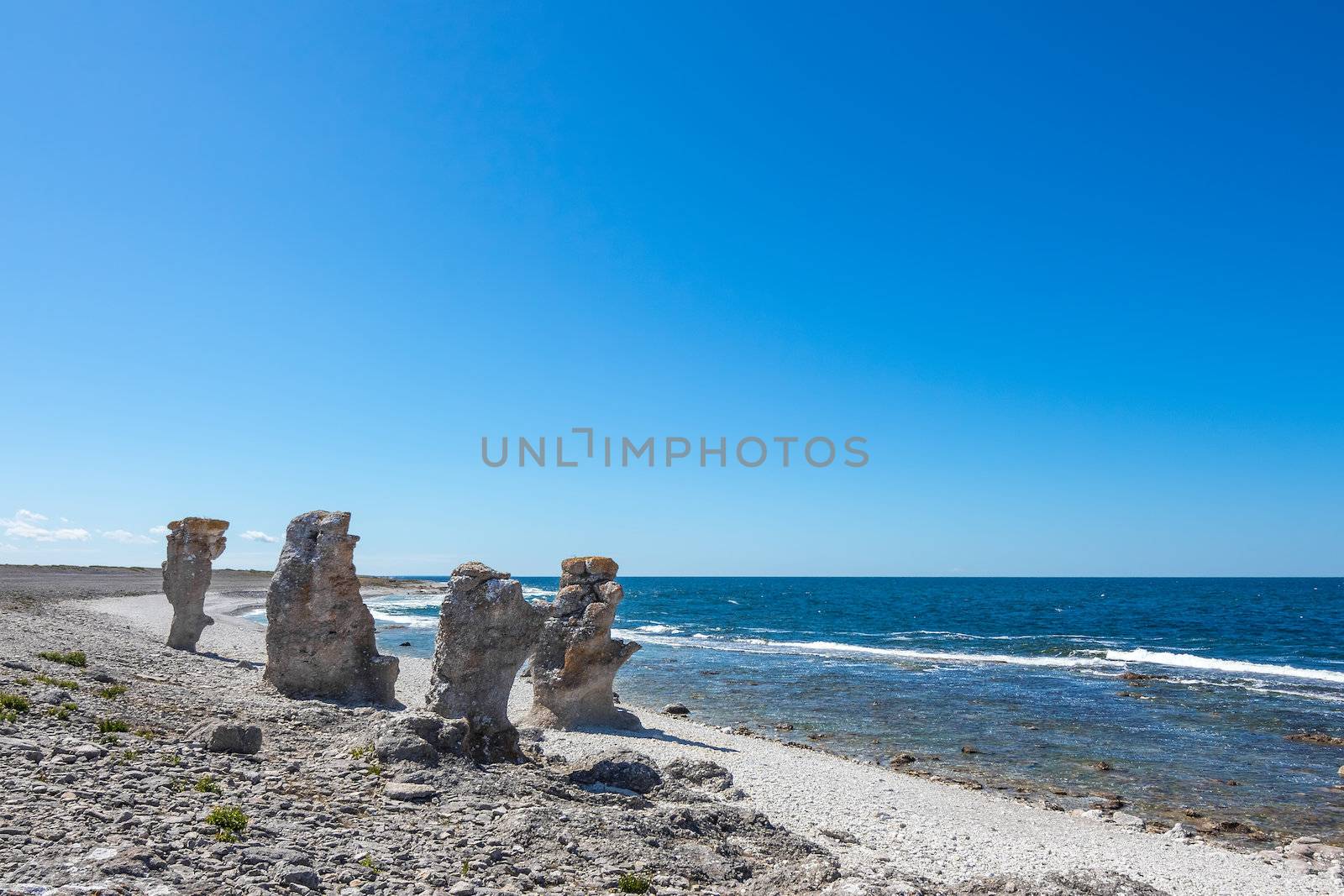 Cliff formations at the rocky coast of Fårö island in Gotland, Sweden. These cliffs are called "rauk" in Swedish.