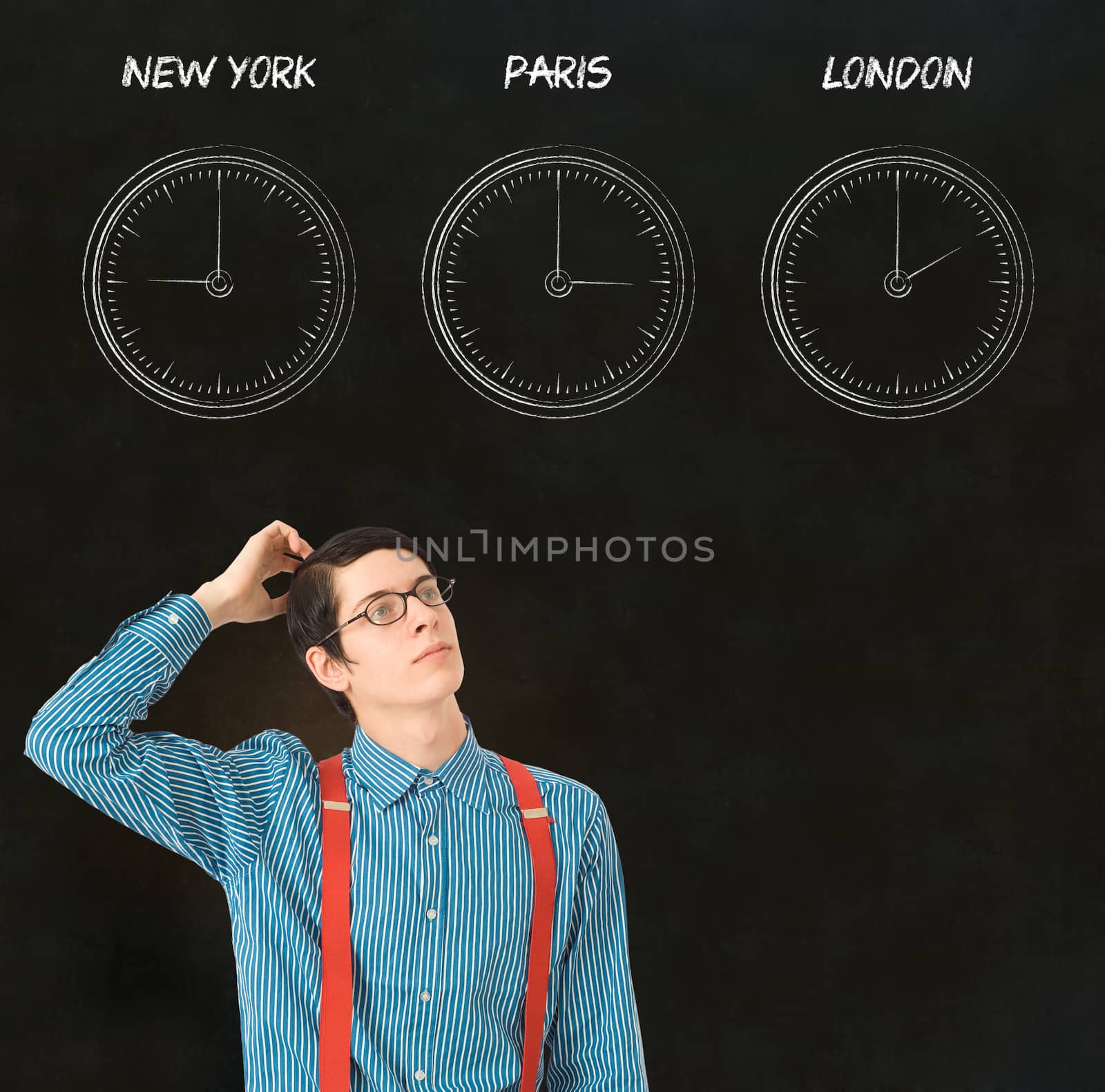 Nerd geek businessman with chalk time difference clocks on blackboard background