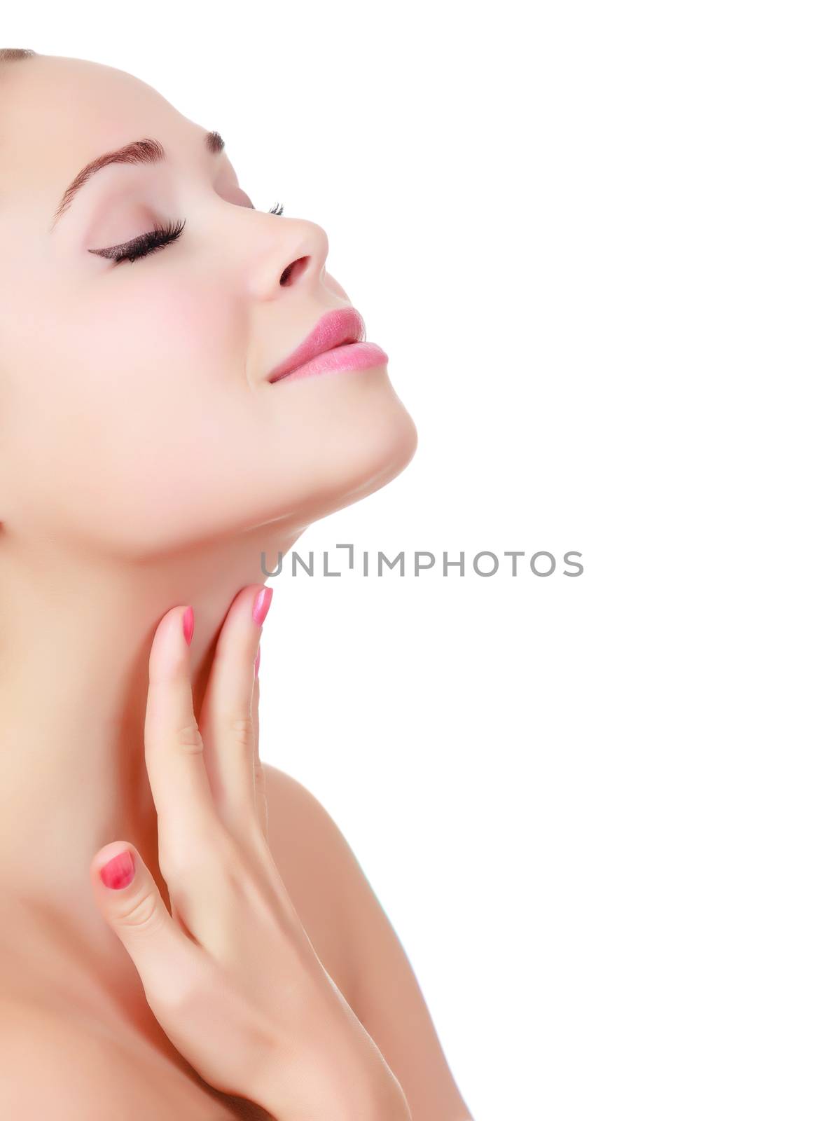 Woman touches her neck, white background