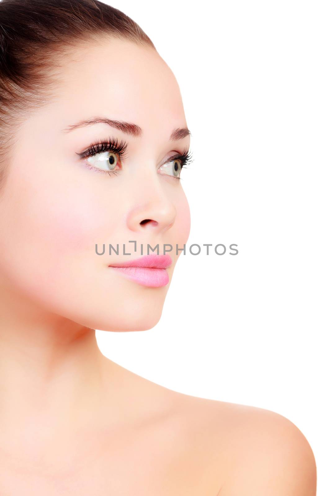 face of a beautiful girl with the clean fresh skin, isolated on white