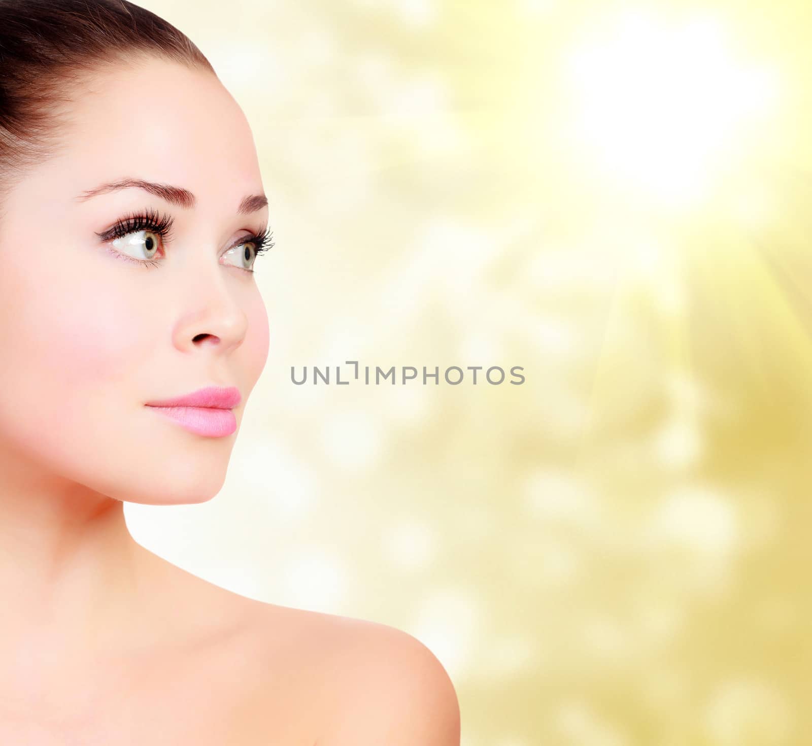 Beautiful woman against an abstract blurred background