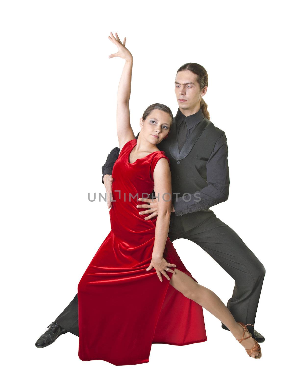 Young couple dancing tango isolated over white