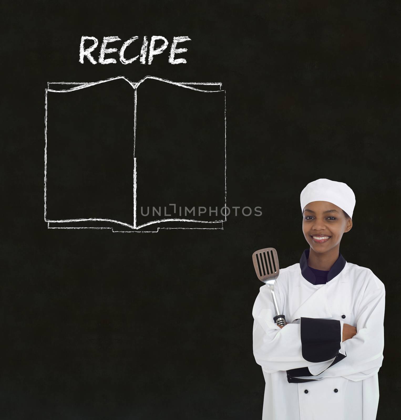 Chef with recipe book on chalk blackboard menu background by alistaircotton