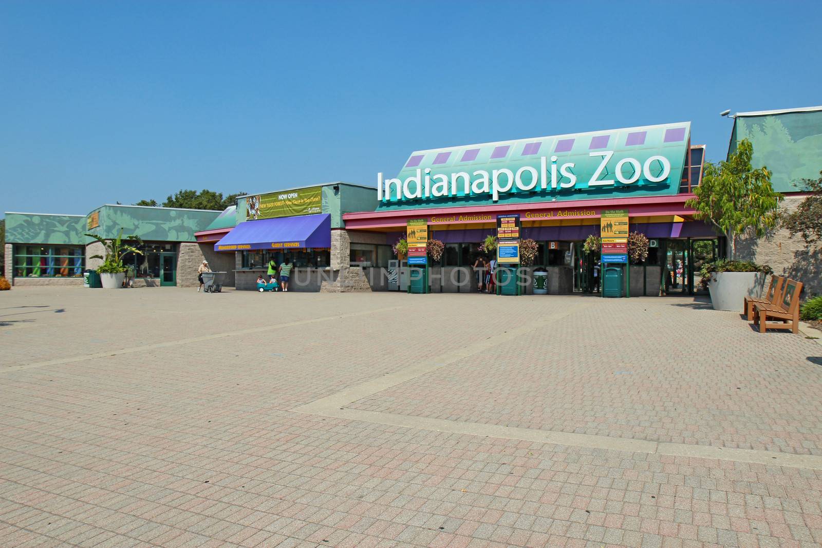 Entrance to the Indianapolis Zoo against a bright blue sky by sgoodwin4813