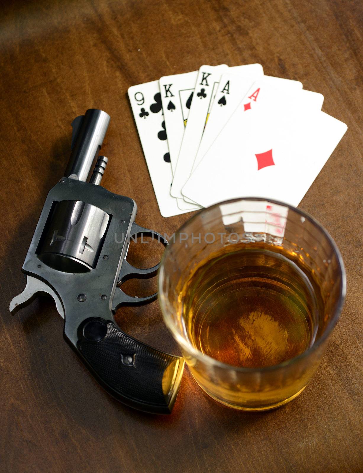 winning hand with two pairs and a gun for a deadly poker game