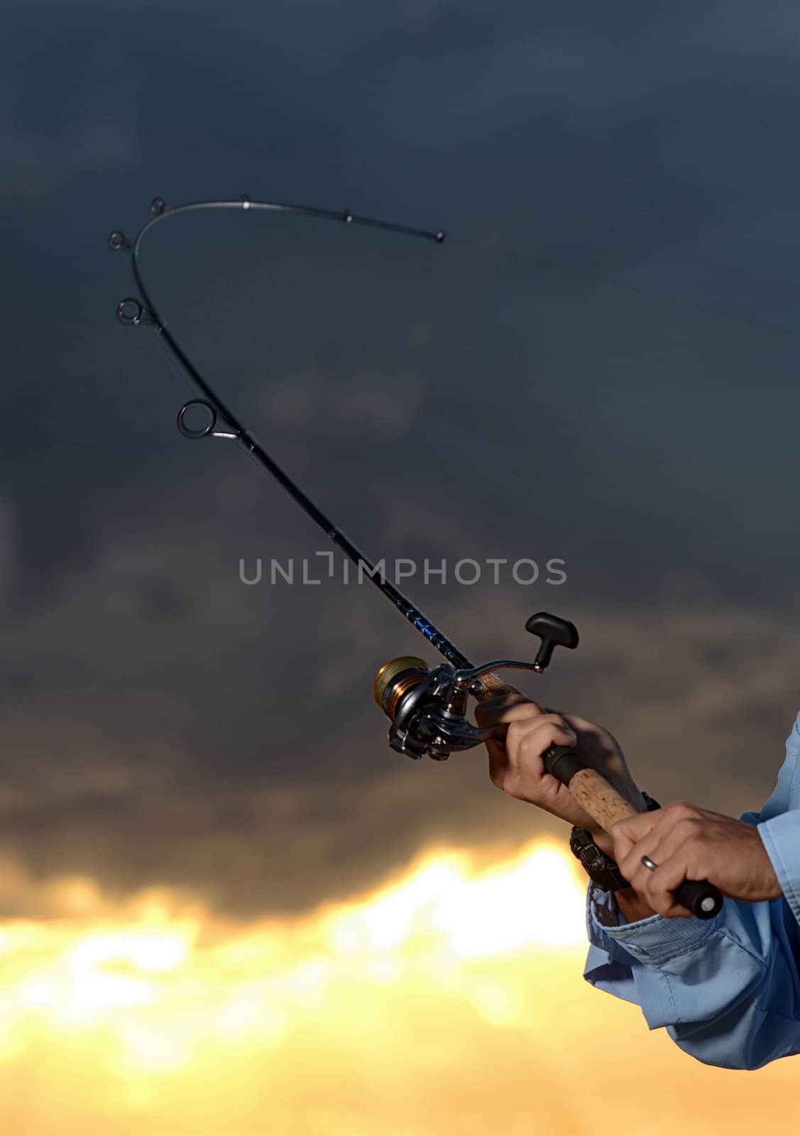big catch while fishing with rod and reel by ftlaudgirl