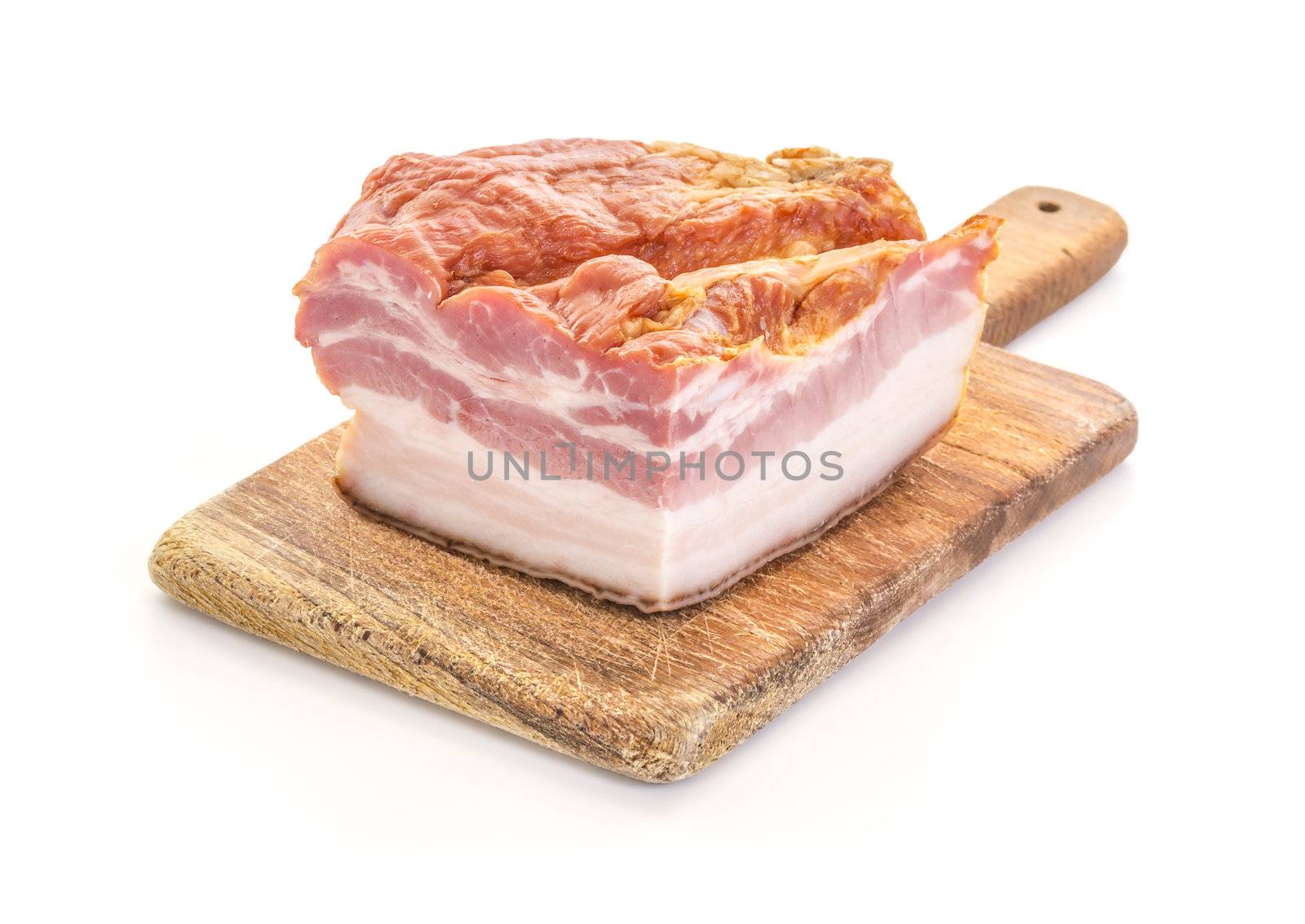 Smoked Bacon on Old Wooden Cutting Board over white