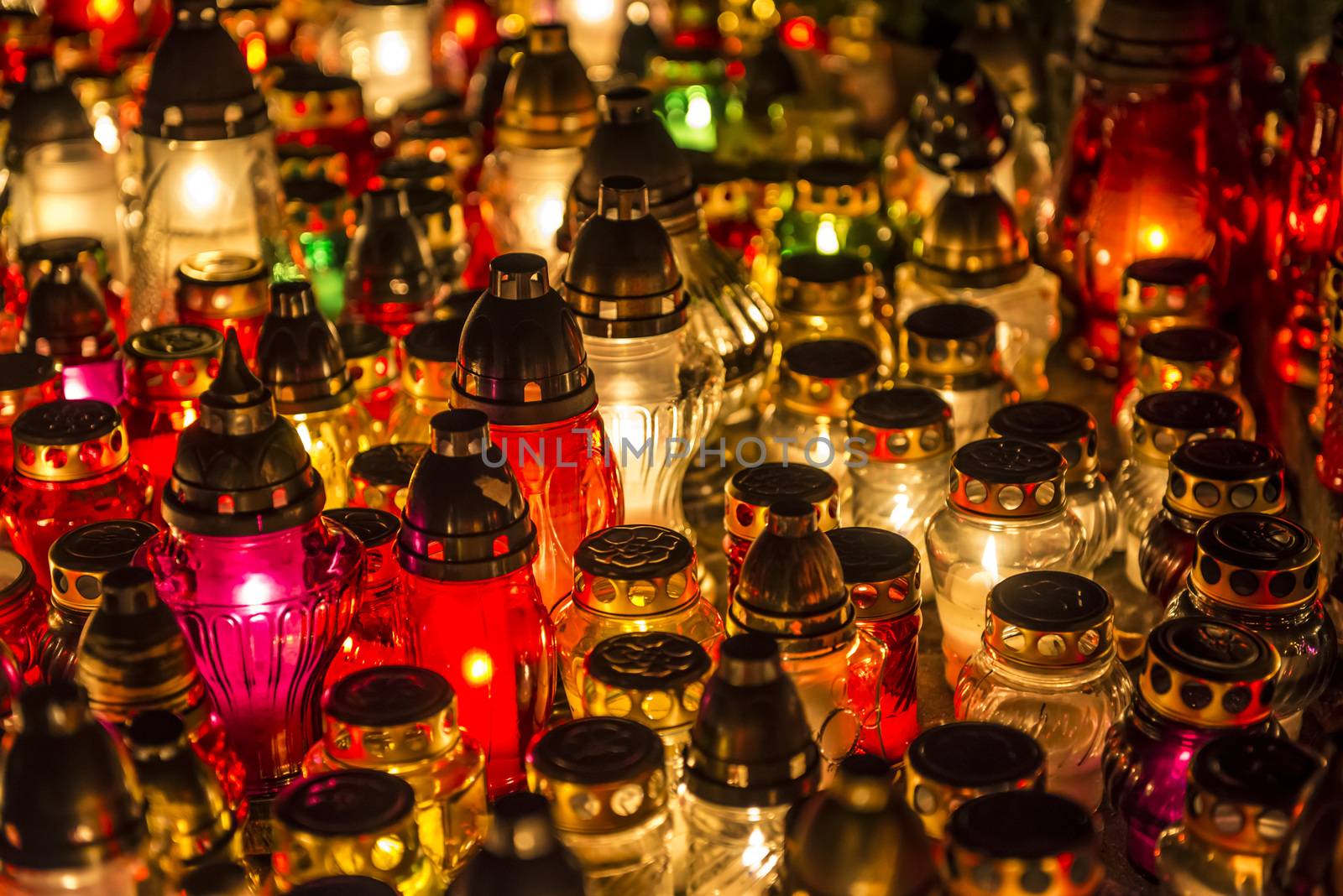 Candles on a grave at night