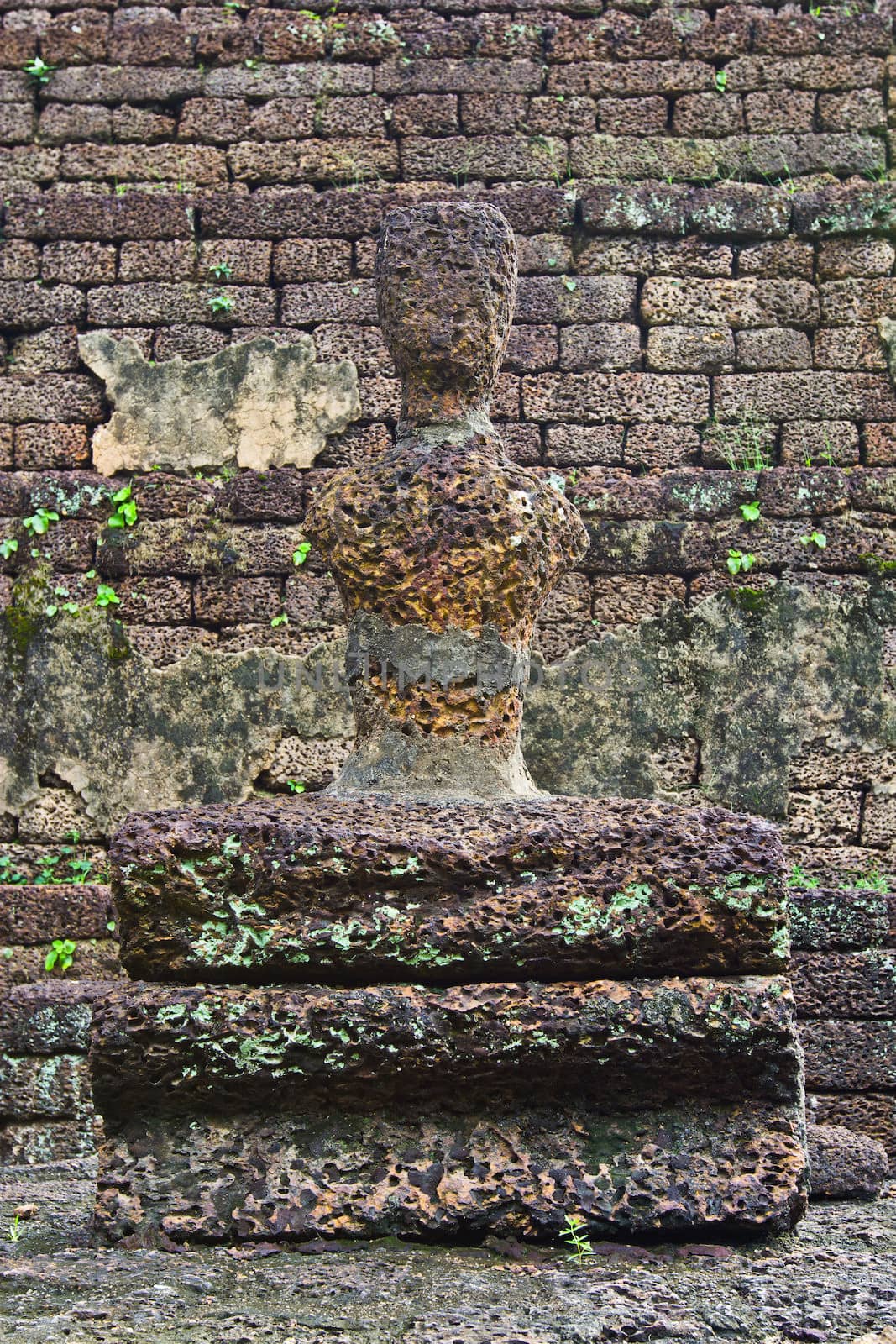 Laterite buddha image in Satchanalai Historical Park of Thailand