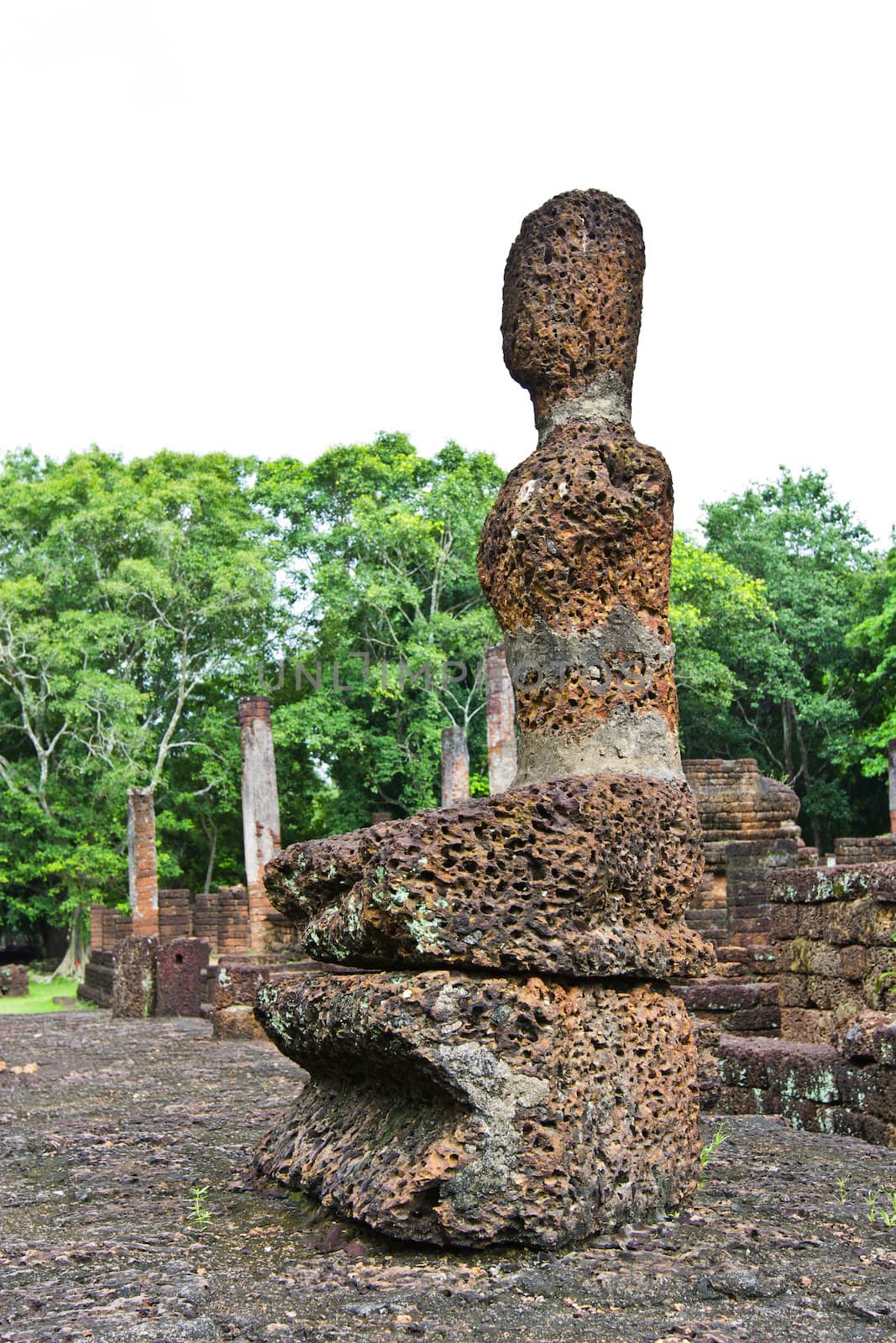 Laterite buddha image in Satchanalai Historical Park of Thailand