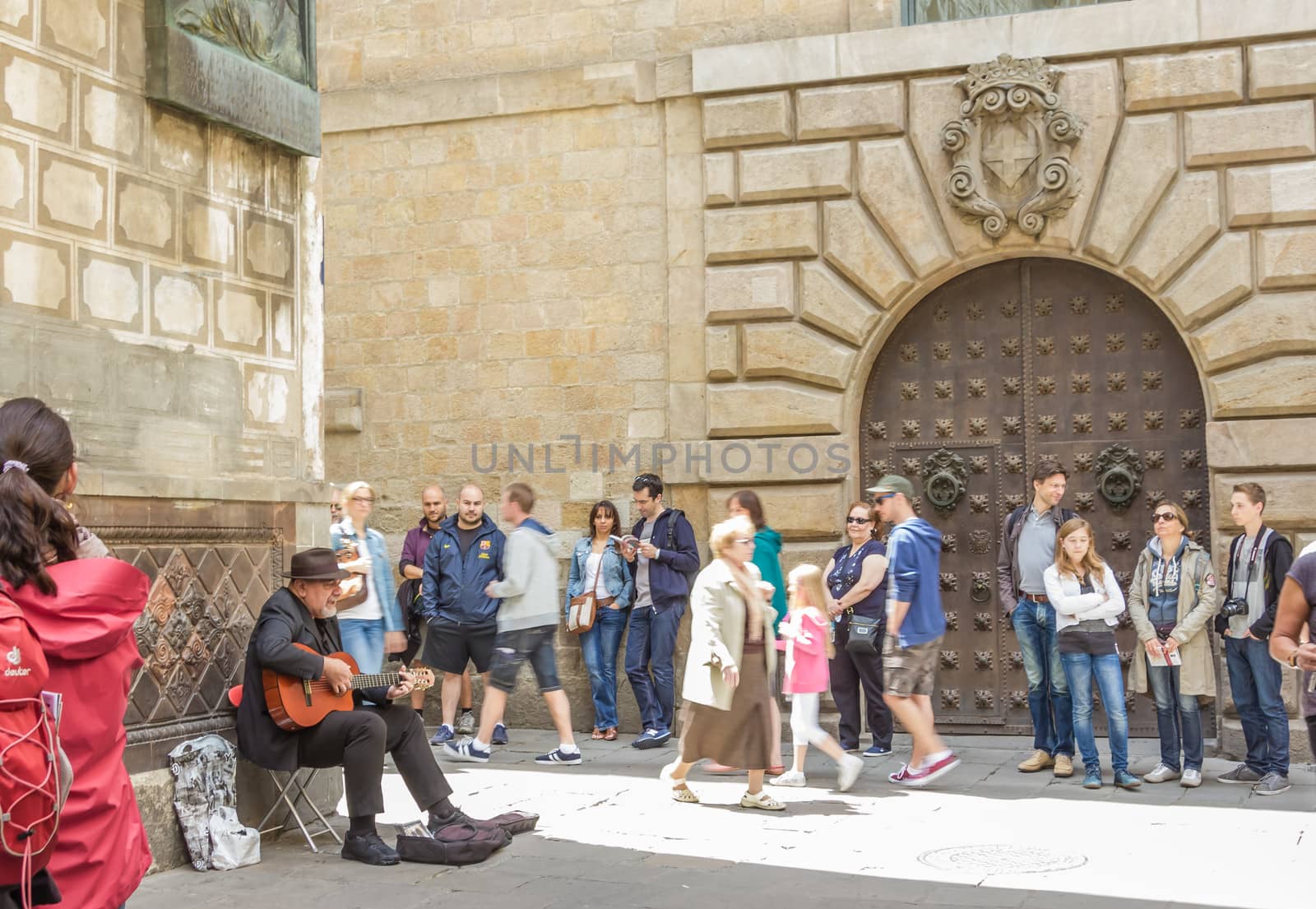 Traditional spanish guitar player in the gothic quarter of Barce by doble.d