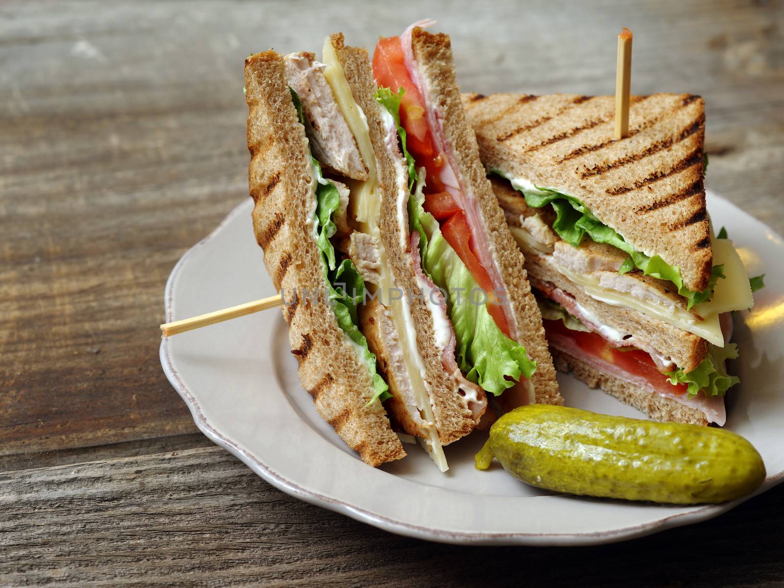 Club sandwich on a plate by sumners
