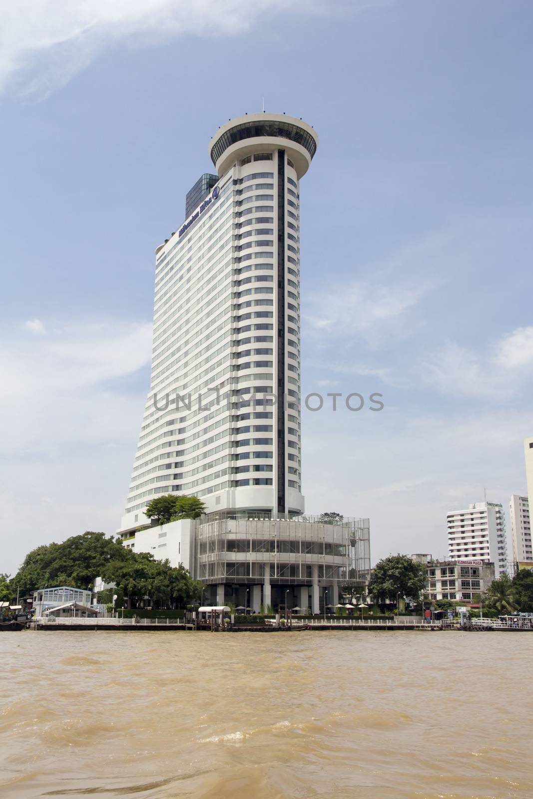 BANGKOK, THAILAND- SEP 25TH: The Hilton Millenium hotel on the Chao Phraya river, Bangkok on September 25th 2012. Founded in 1919, Hilton has more than 550 hotels across 6 continents.
