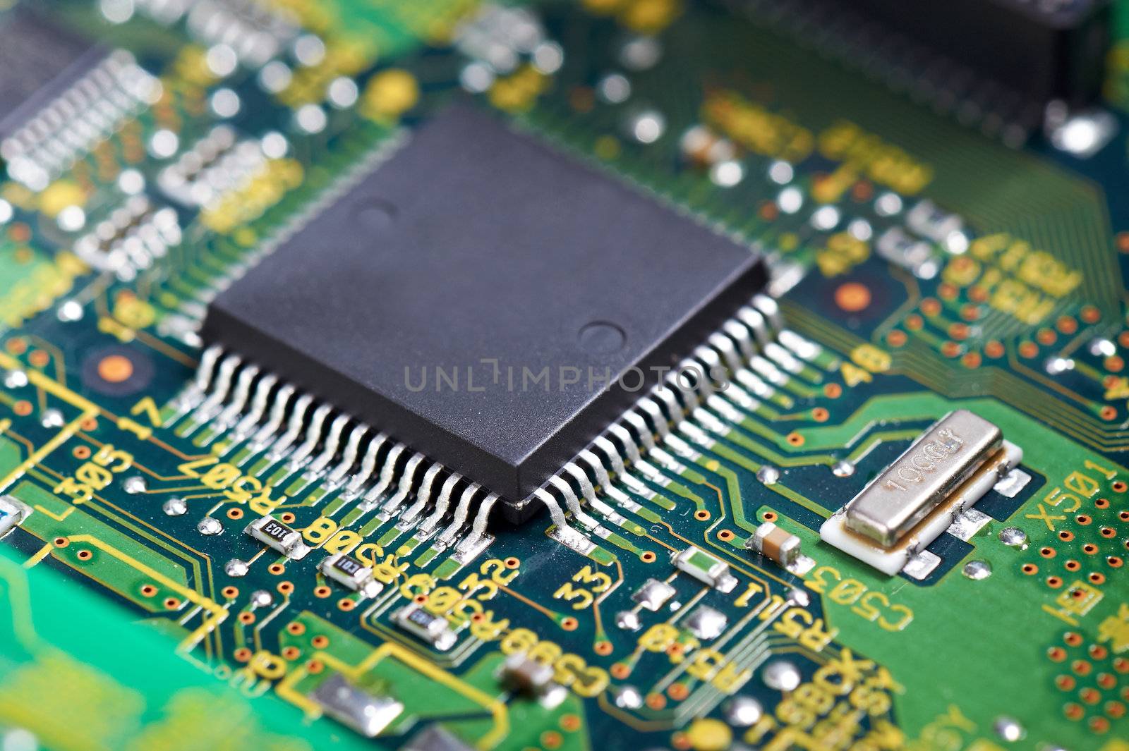 Close-up of chip on computer circuit board.