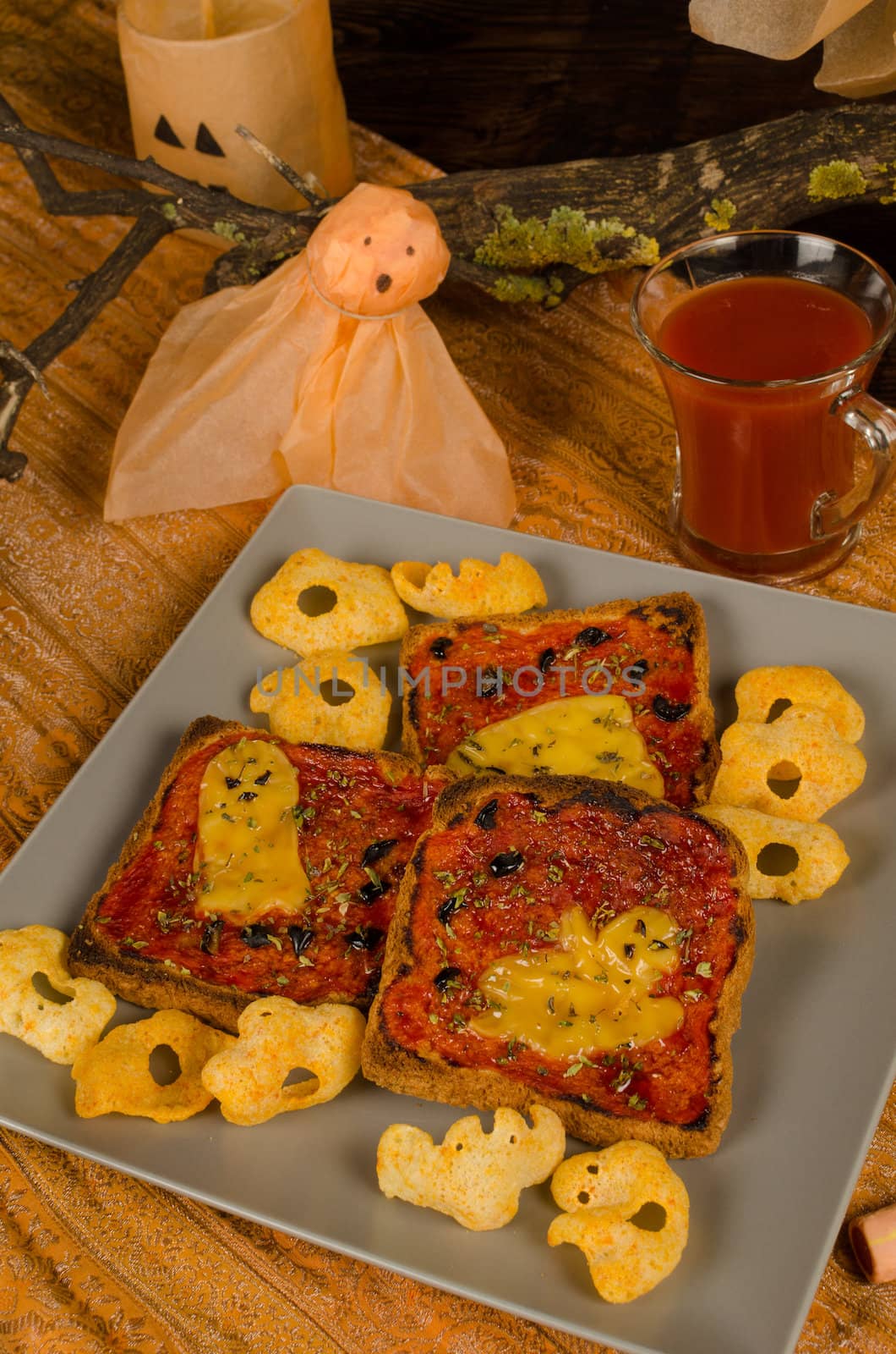 Slices of toast prepared and decorated for a kid Halloween party