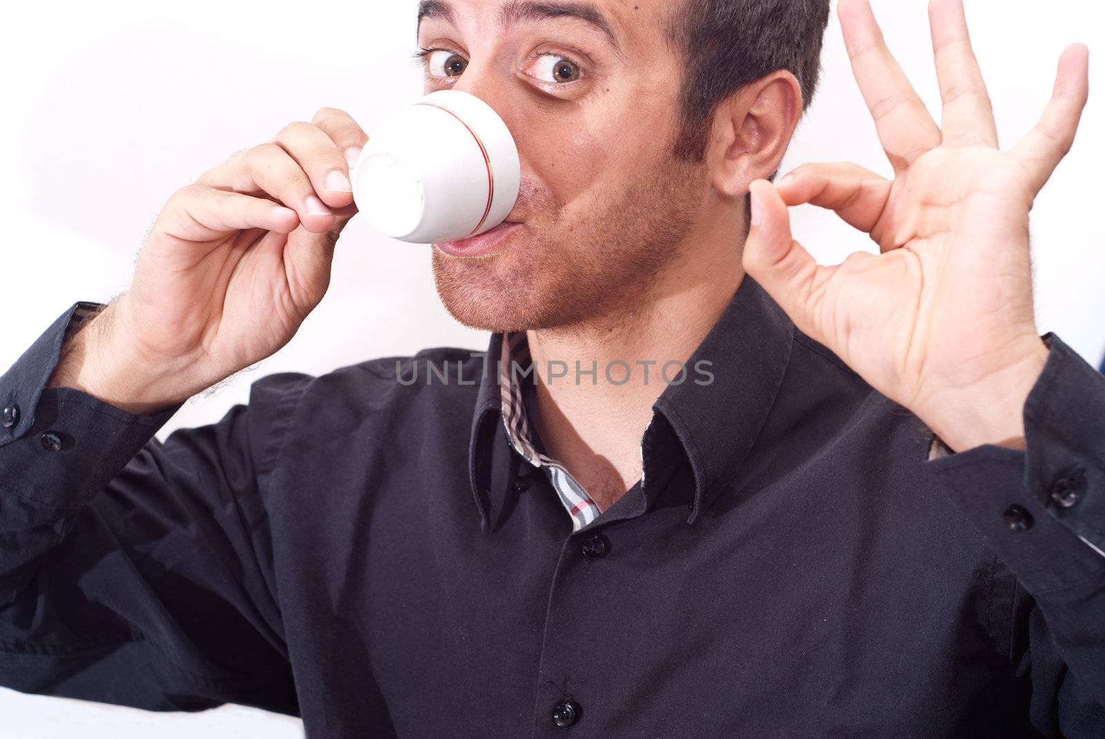 Close up portrait of a businessman drinking coffee isolatrd on white