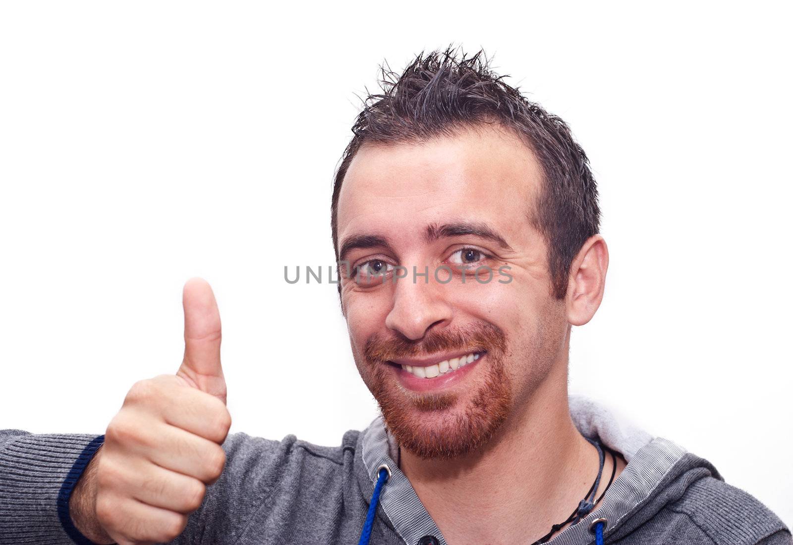 Portrait Of A Happy Young Man Showing Thumb Up Sign Isolated On White Background