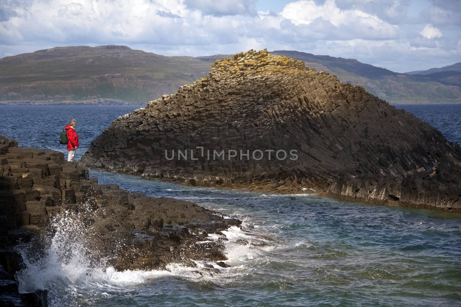 Basalt rock formation on the island of Staffa in the Treshnish Islands in the Inner Hebrides off the west coast of Scotland. (Model Released)