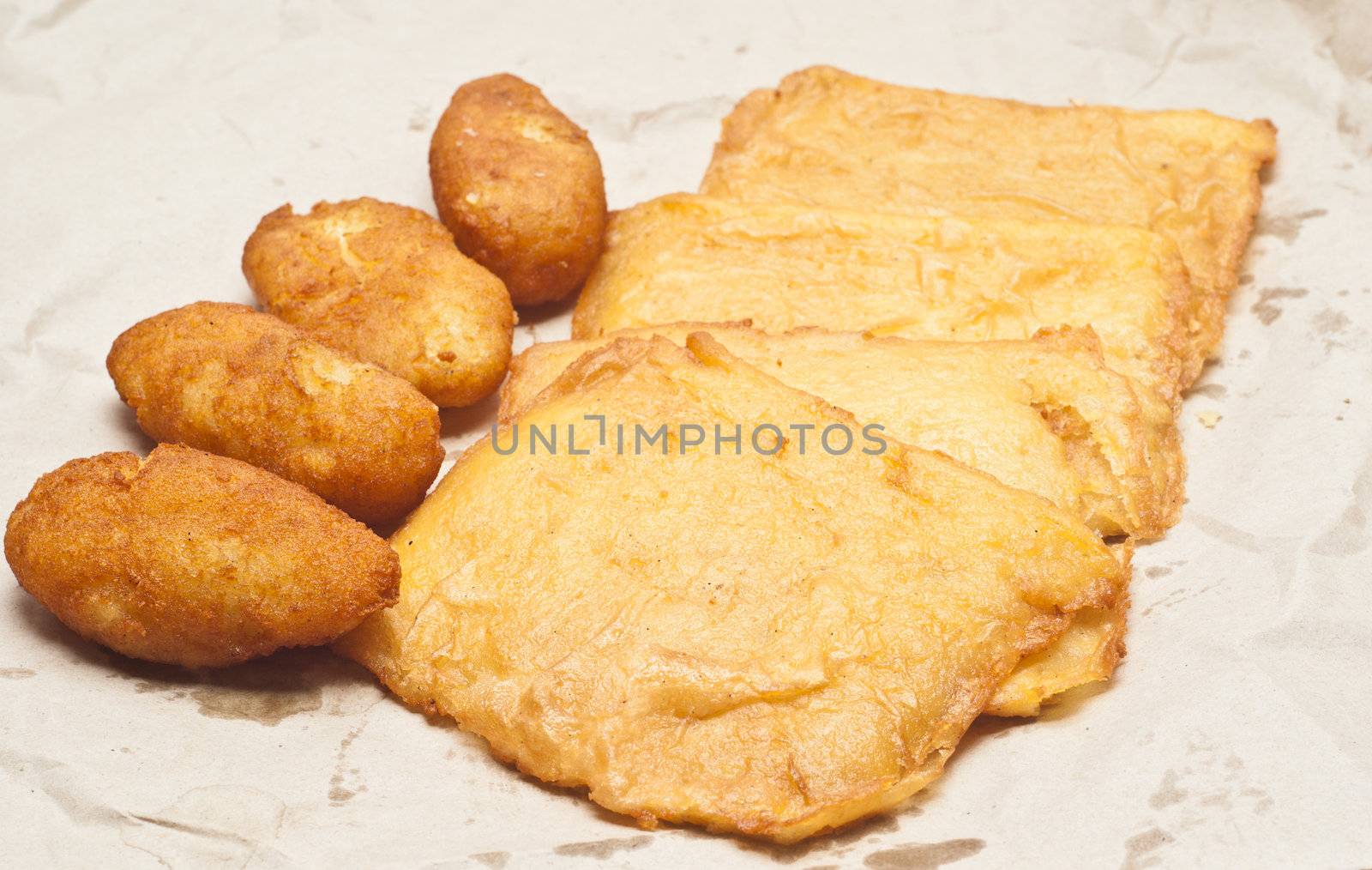 Sandwich with panelle and crocchette on white background. typical Sicilian food