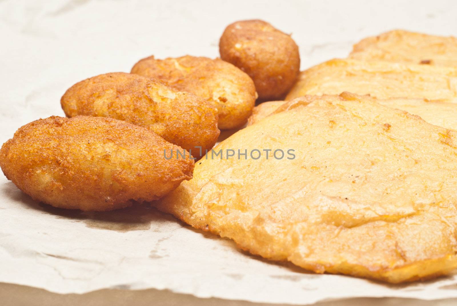 Sandwich with panelle and crocchette on white background. typical Sicilian food