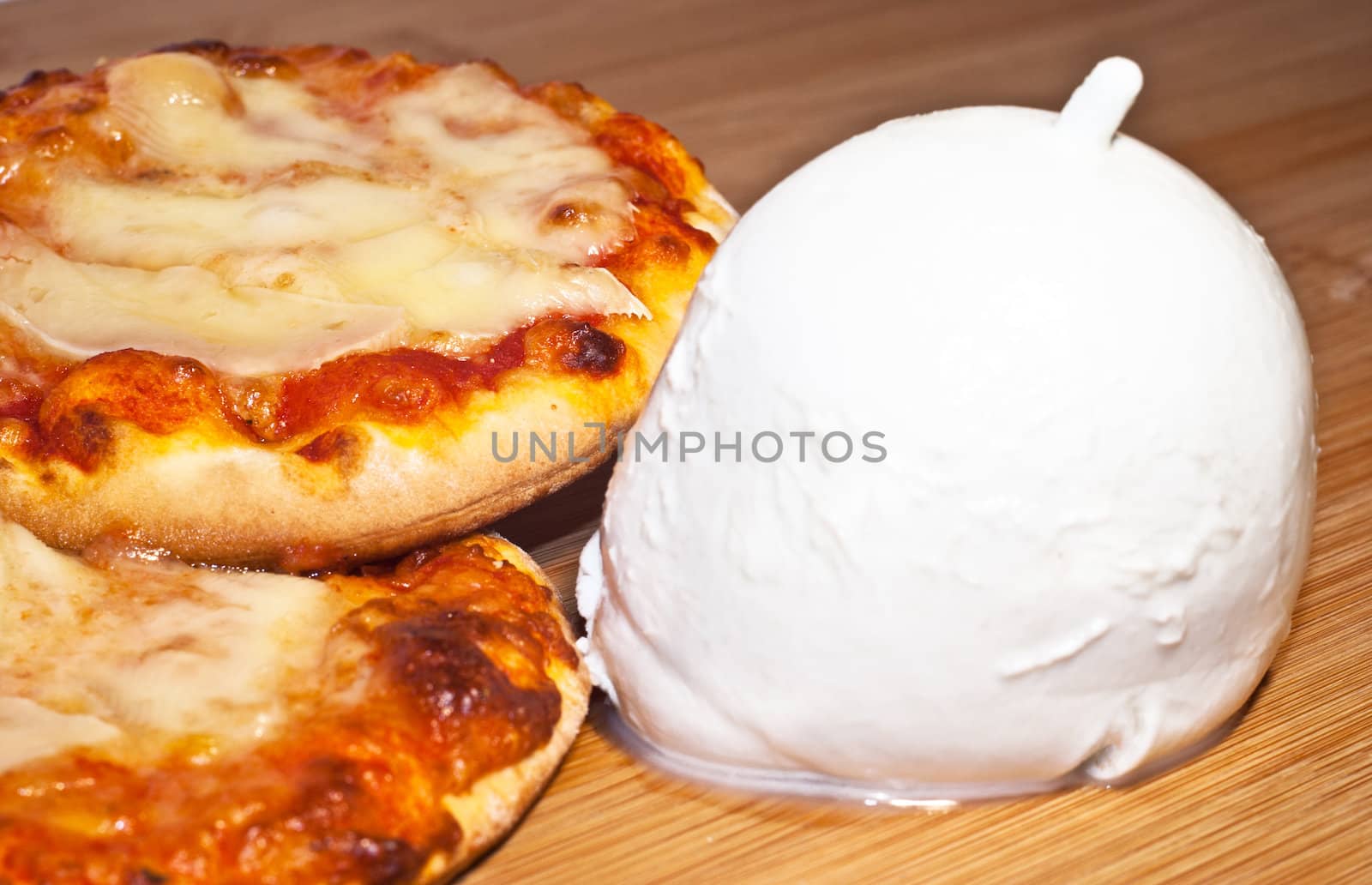 closeup of mini pizza with mozzarella