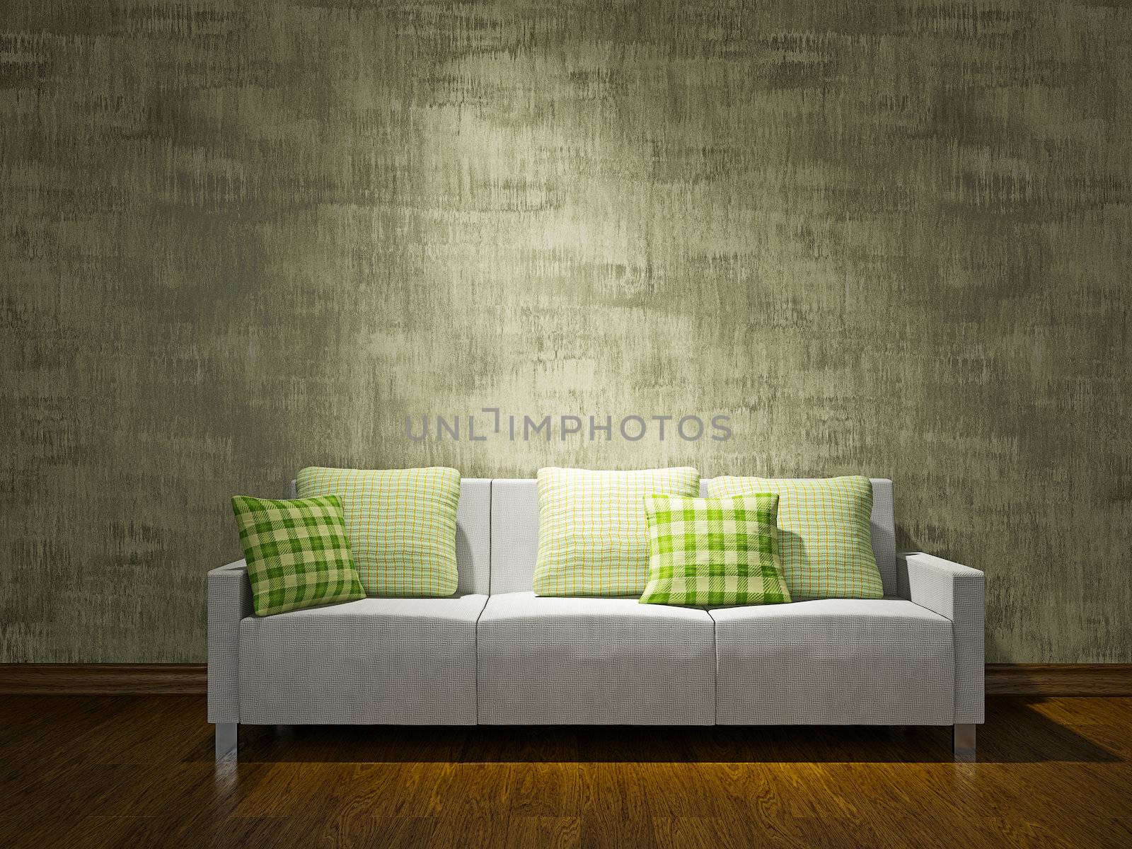 White sofa with pillows near the concrete wall