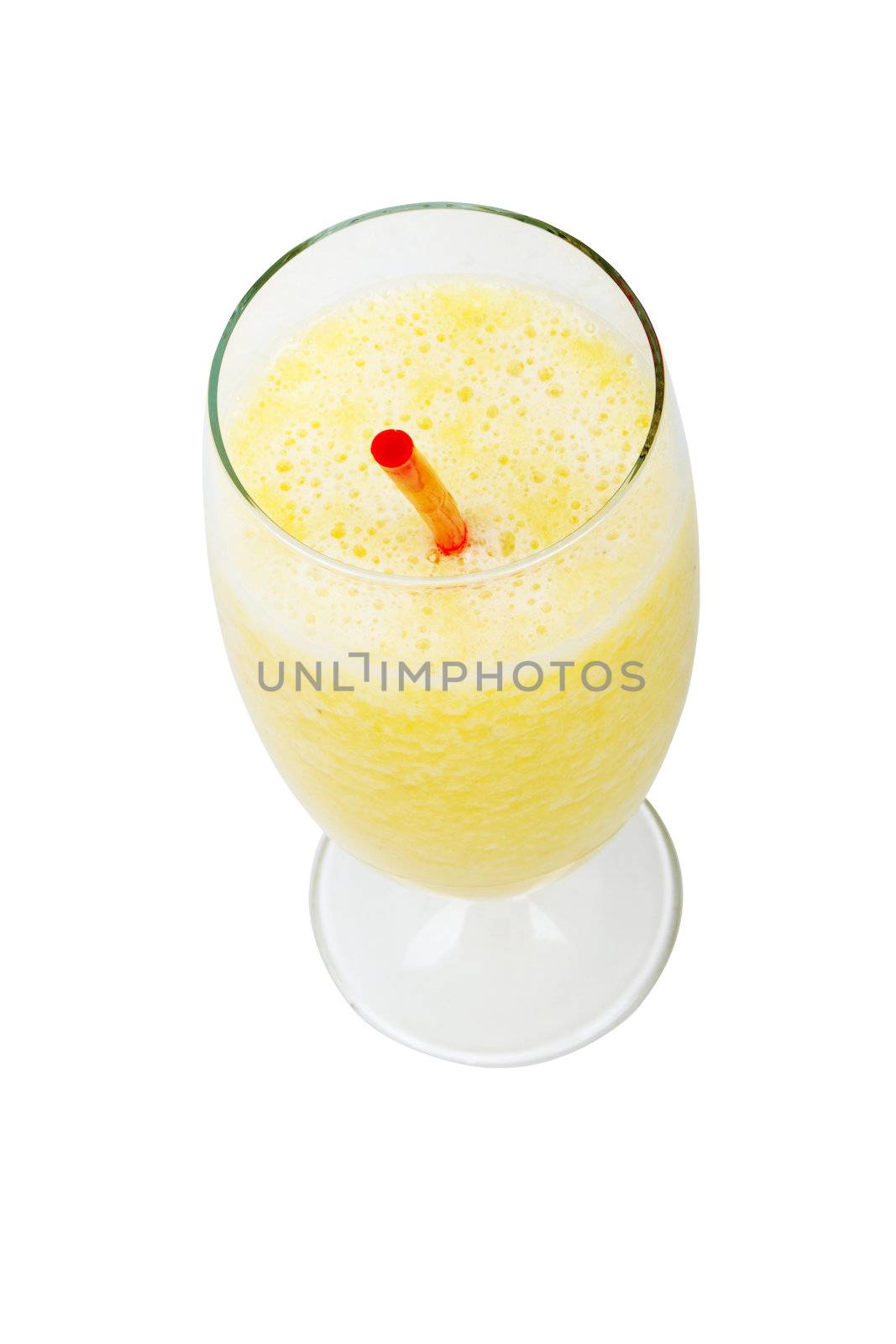 glass of fresh pineapple and banana juice with red straw