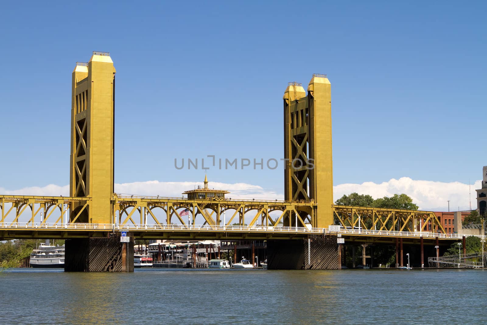 Tower Bridge is a vertical lift bridge in Sacramento, California and spans the Sacramento River and is on the National Register of Historic Places.