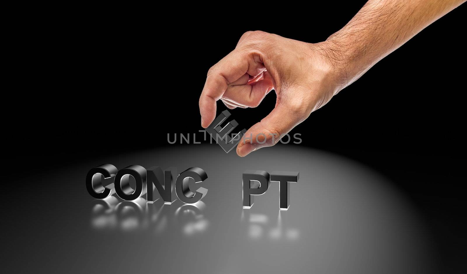 Hand holding the missing letter in the word concept